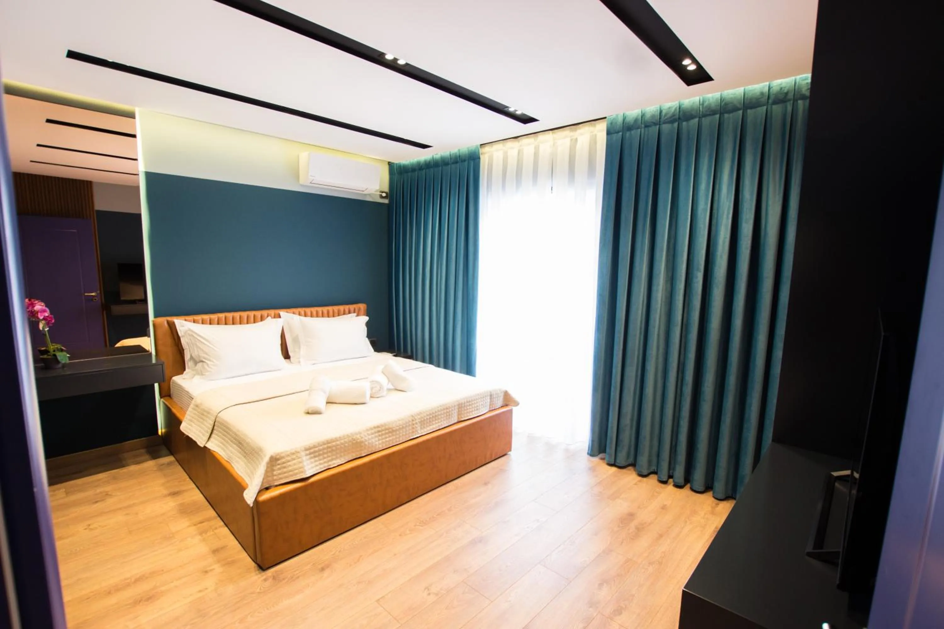Bed in Brilant Luxury Apartment