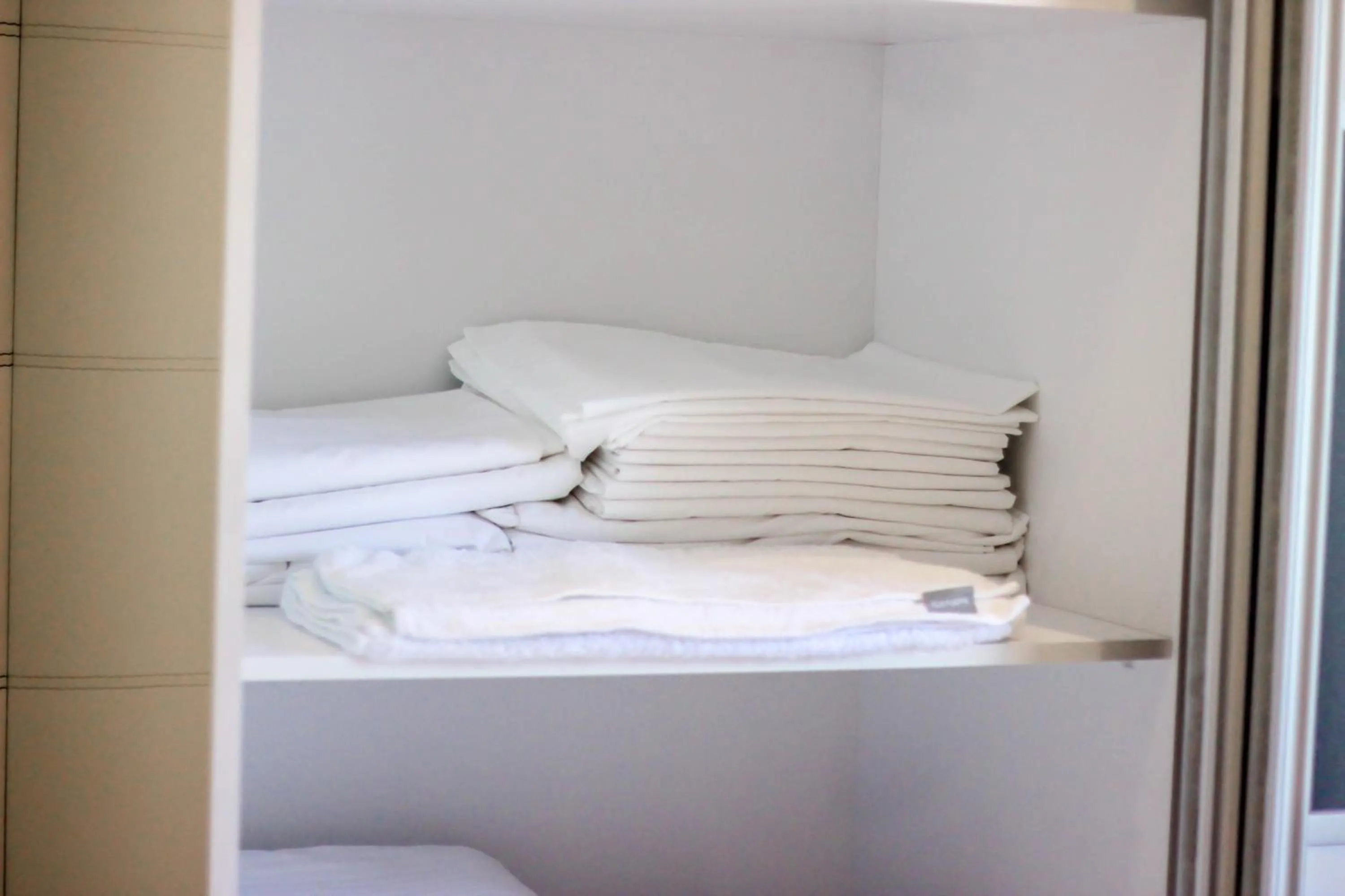 towels, Bed in Brilant Luxury Apartment