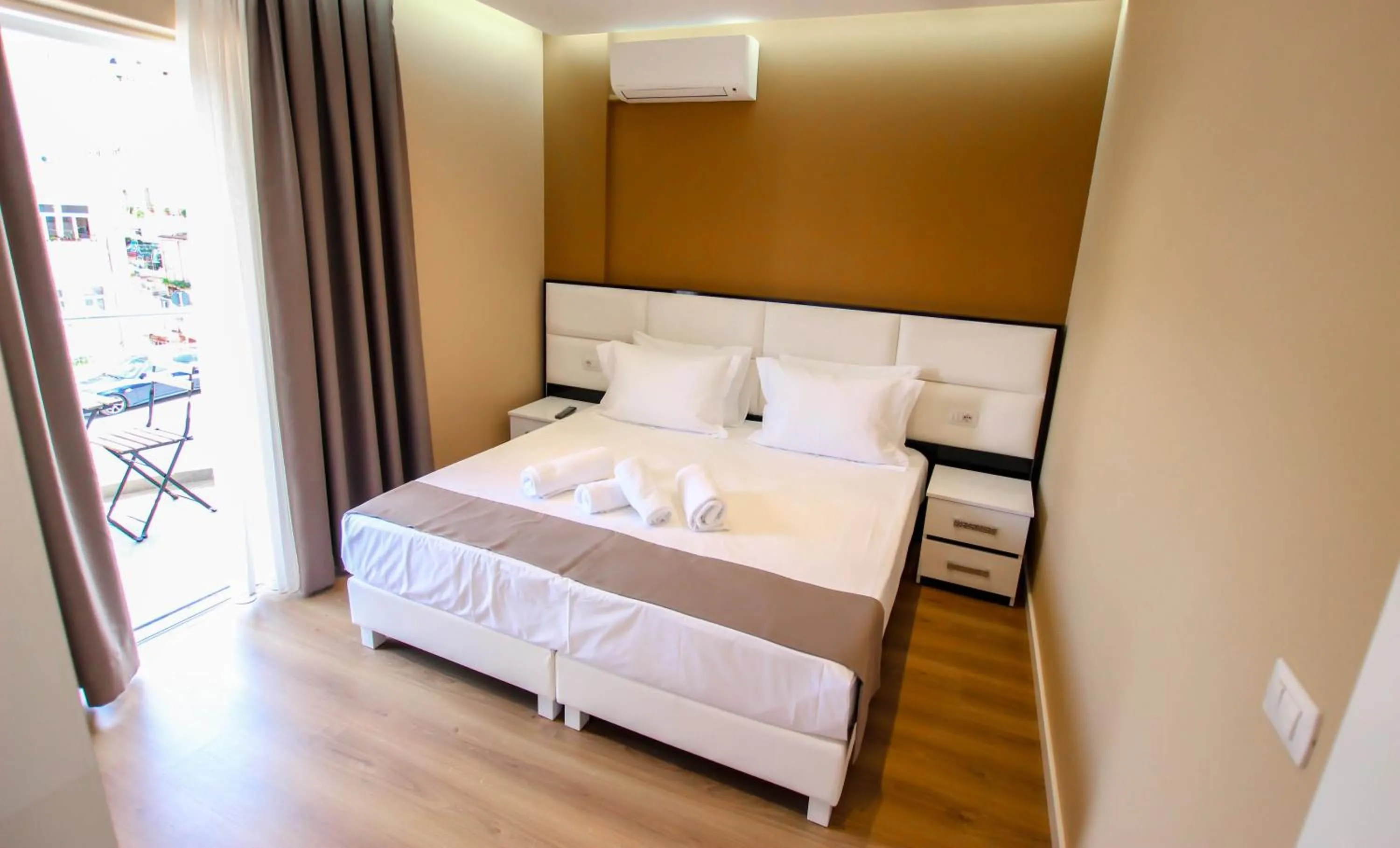 Bed in Brilant Luxury Apartment