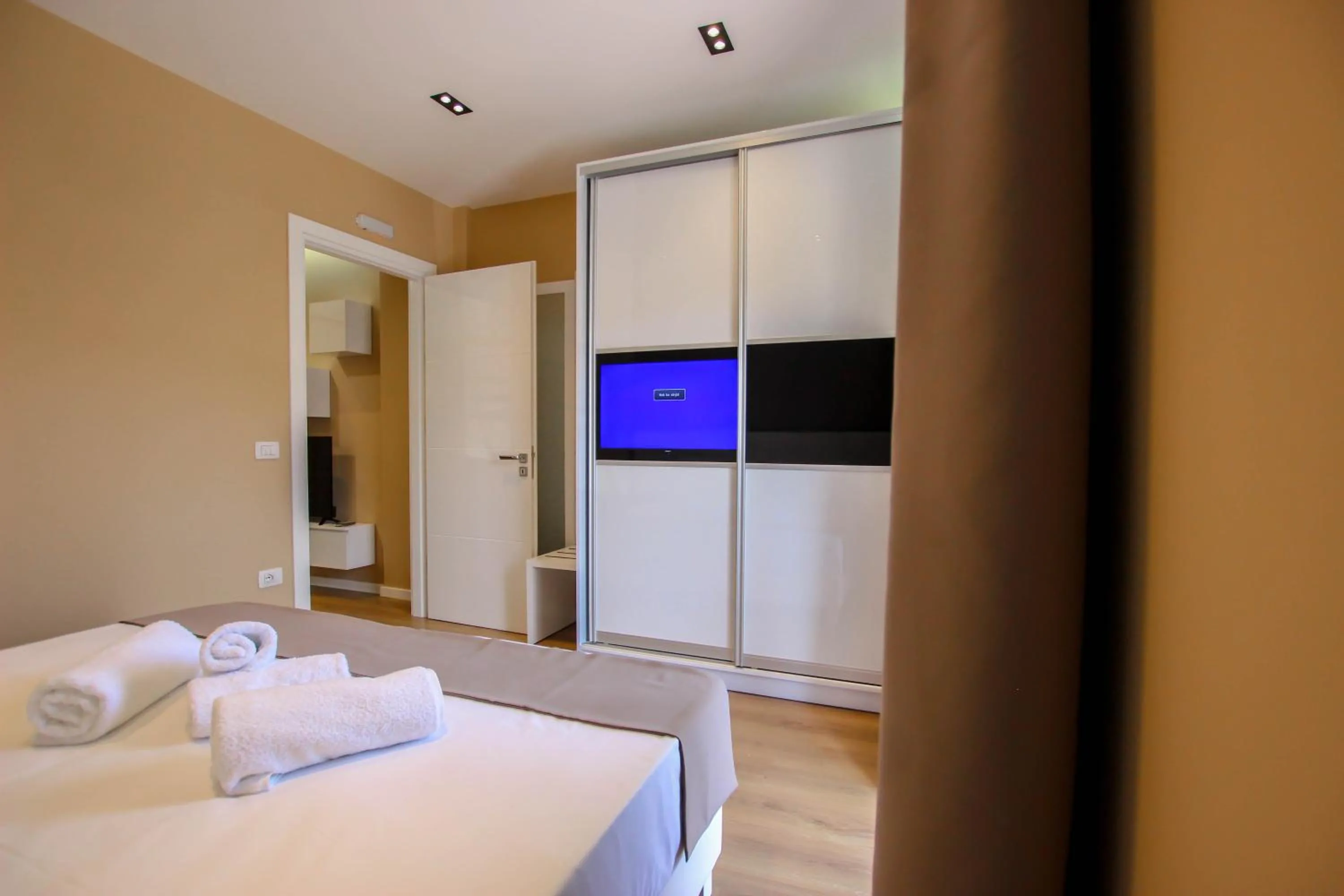 Bed in Brilant Luxury Apartment