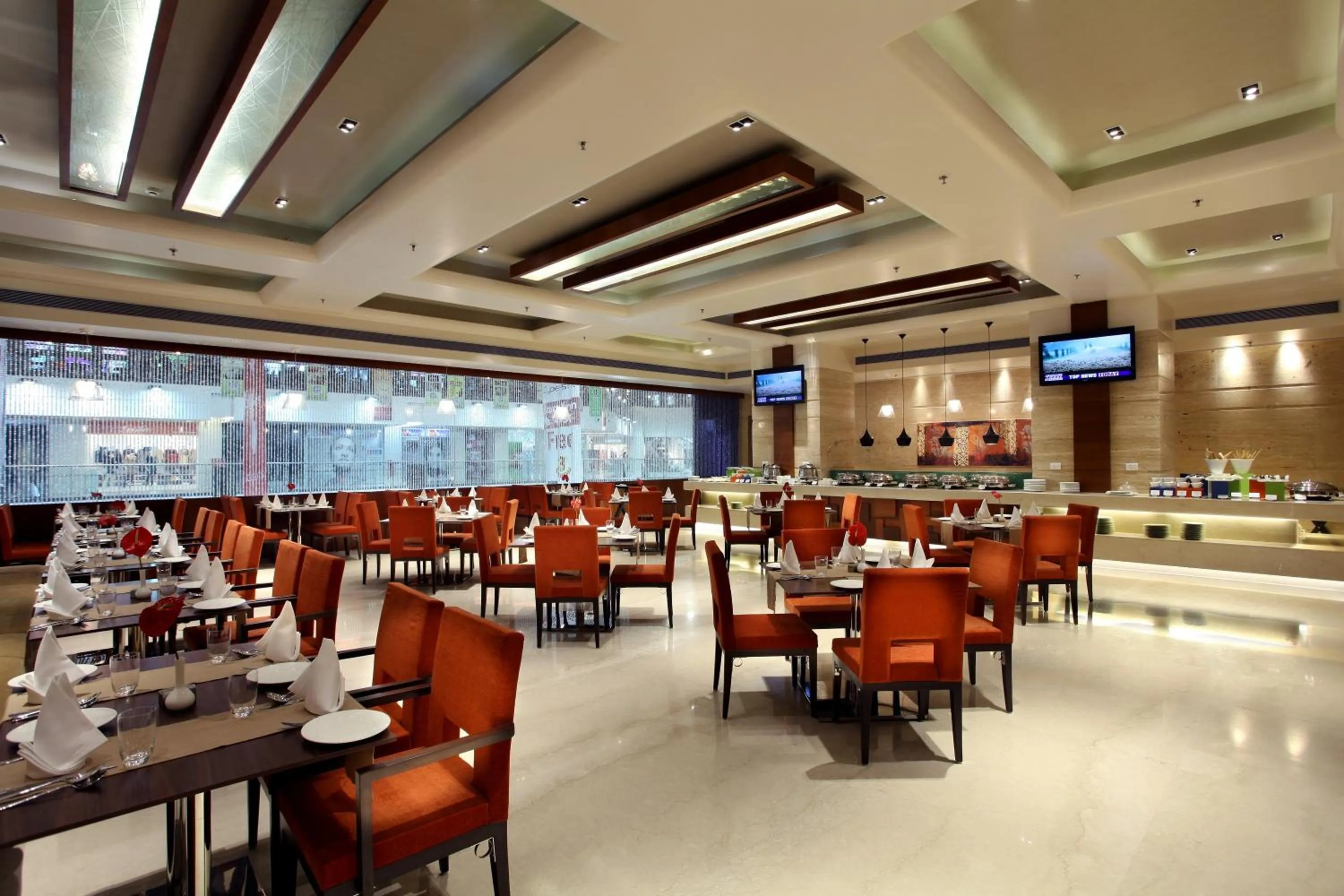 Restaurant/places to eat in Mahagun Sarovar Portico Suites