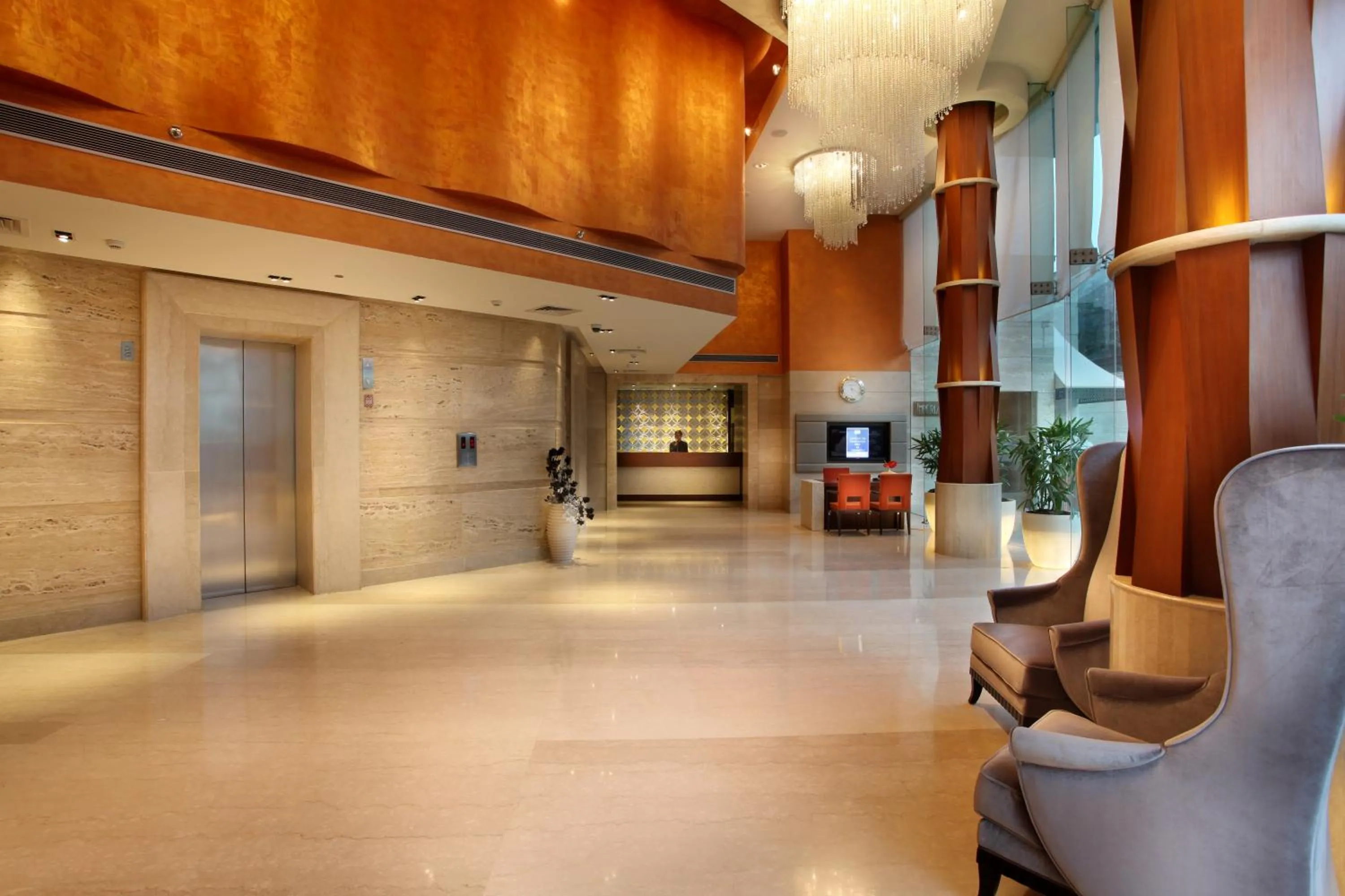 Lobby or reception in Mahagun Sarovar Portico Suites