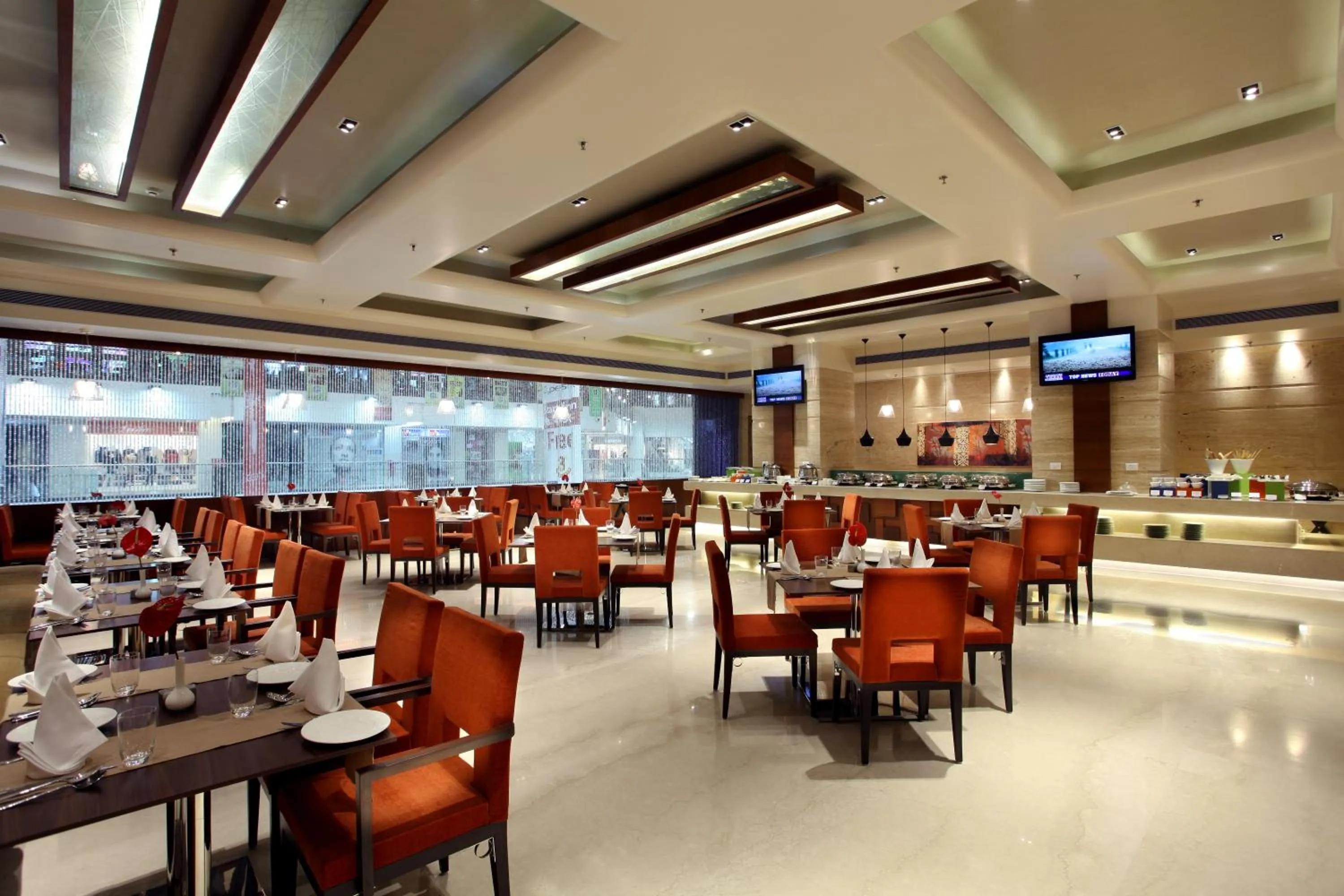Restaurant/places to eat in Mahagun Sarovar Portico Suites