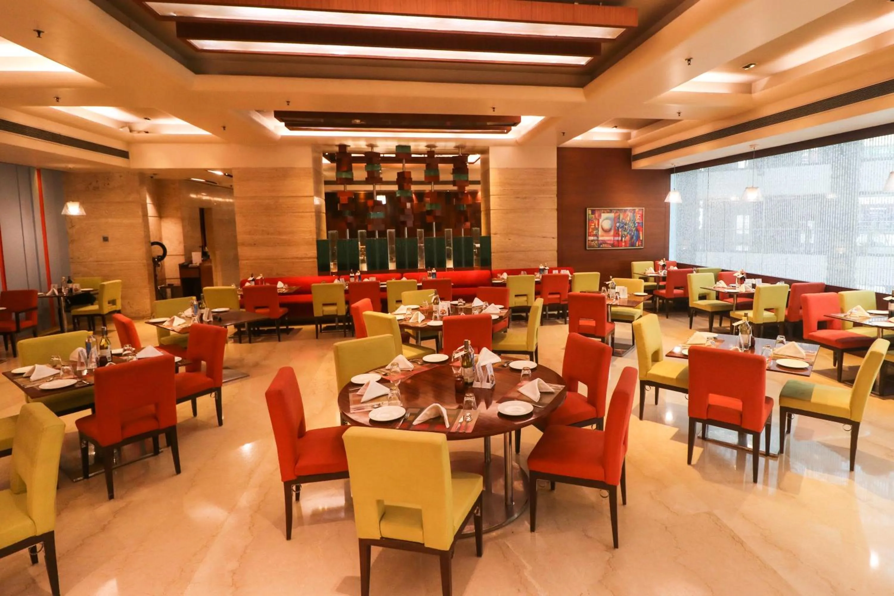 Restaurant/places to eat in Mahagun Sarovar Portico Suites