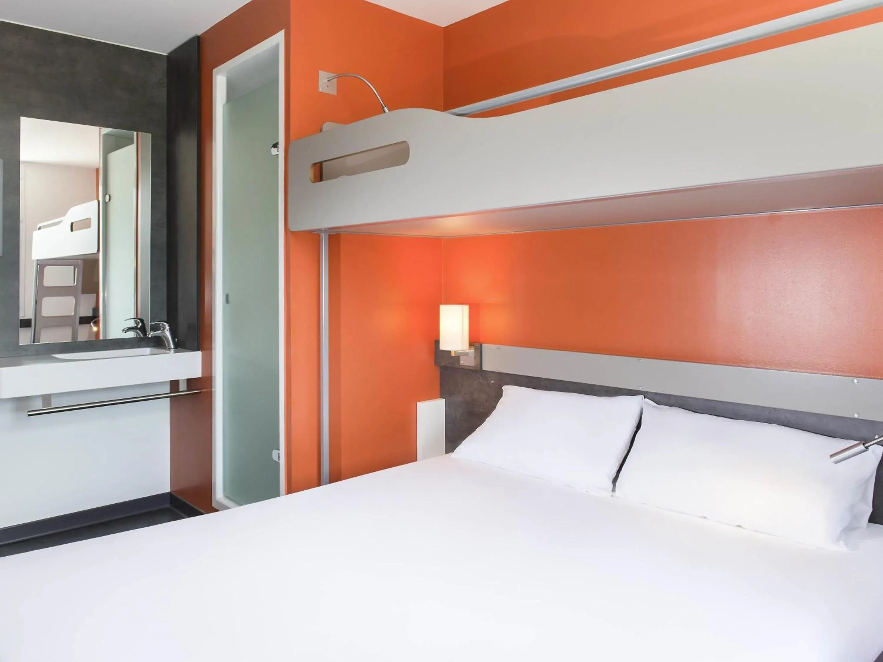 Bedroom, Bed in ibis budget Aéroport Lyon Saint Exupéry Bedroom, Bed in ibis budget Aéroport Lyon Saint Exupéry