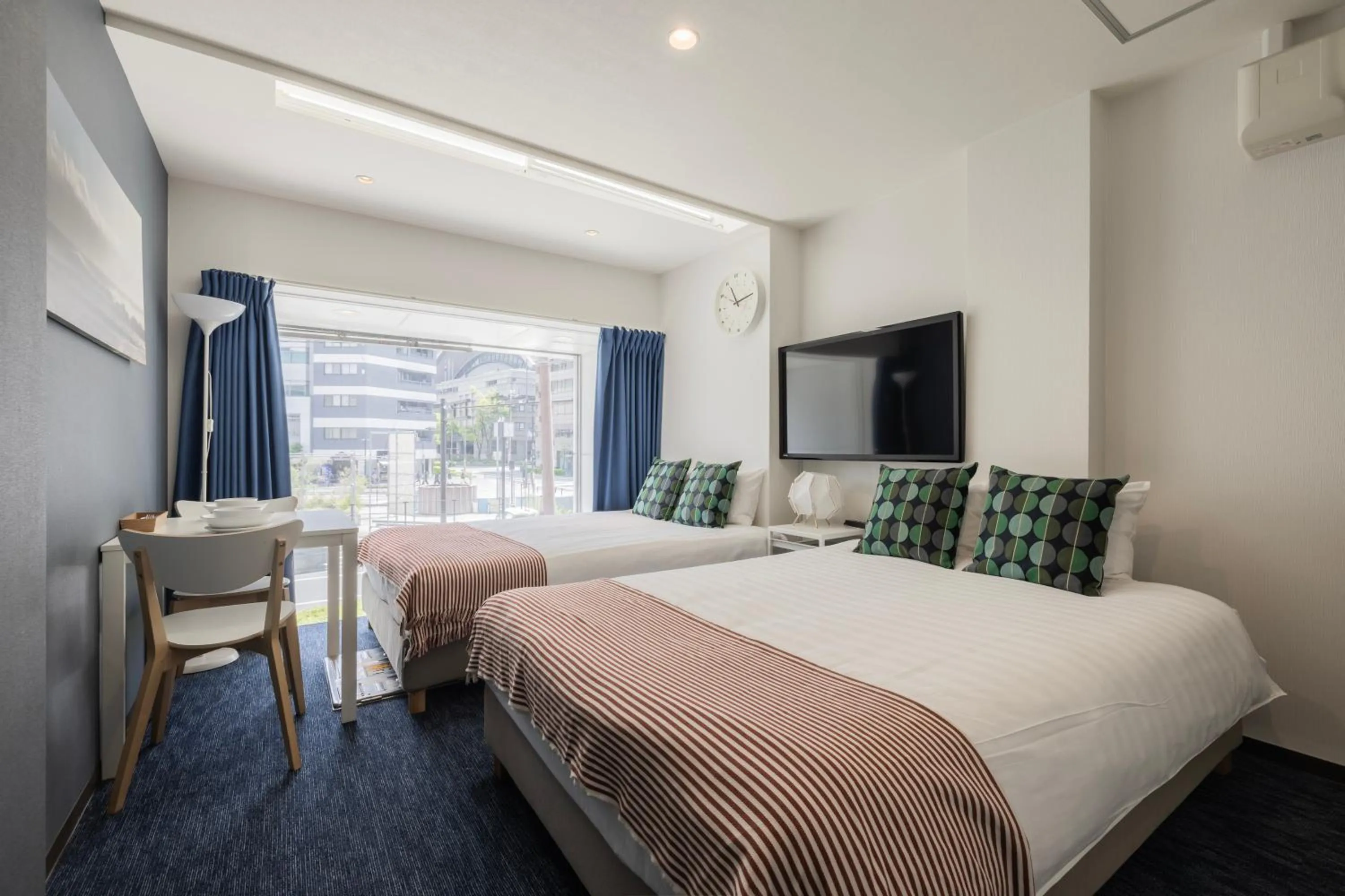 Bed in Namba Garden Square Apartment