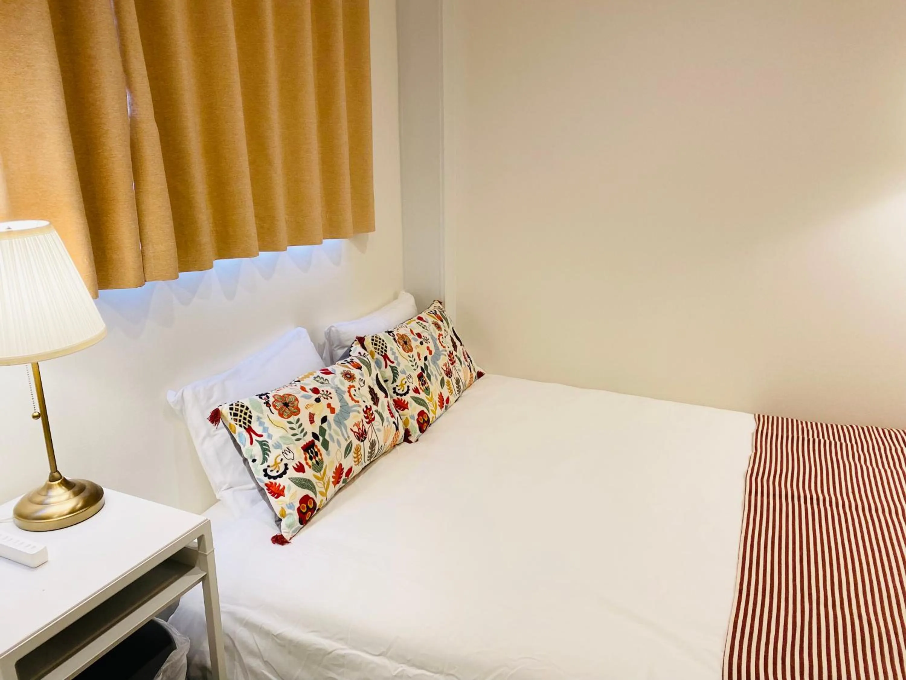 Bed in Namba Garden Square Apartment