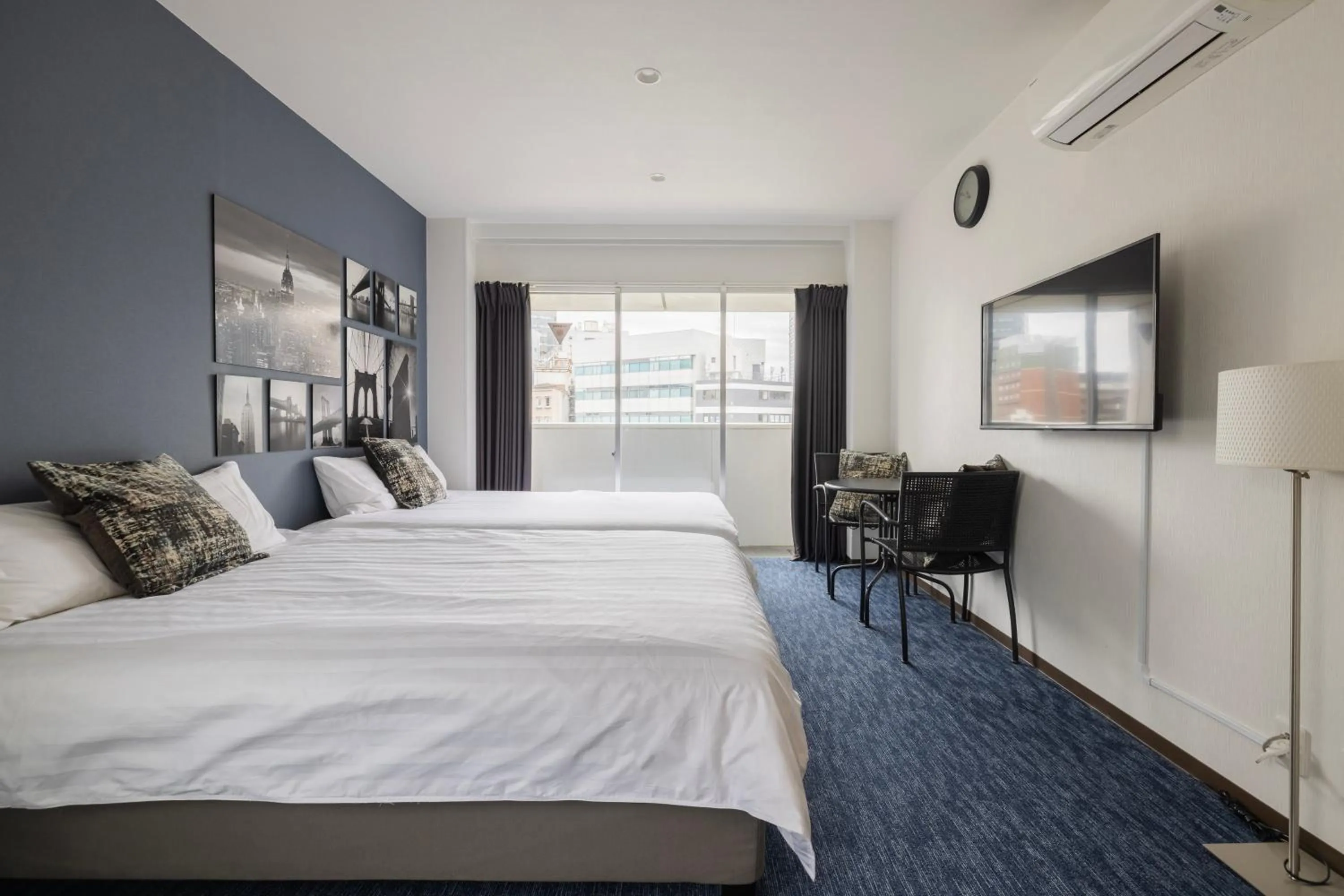 Bed in Namba Garden Square Apartment