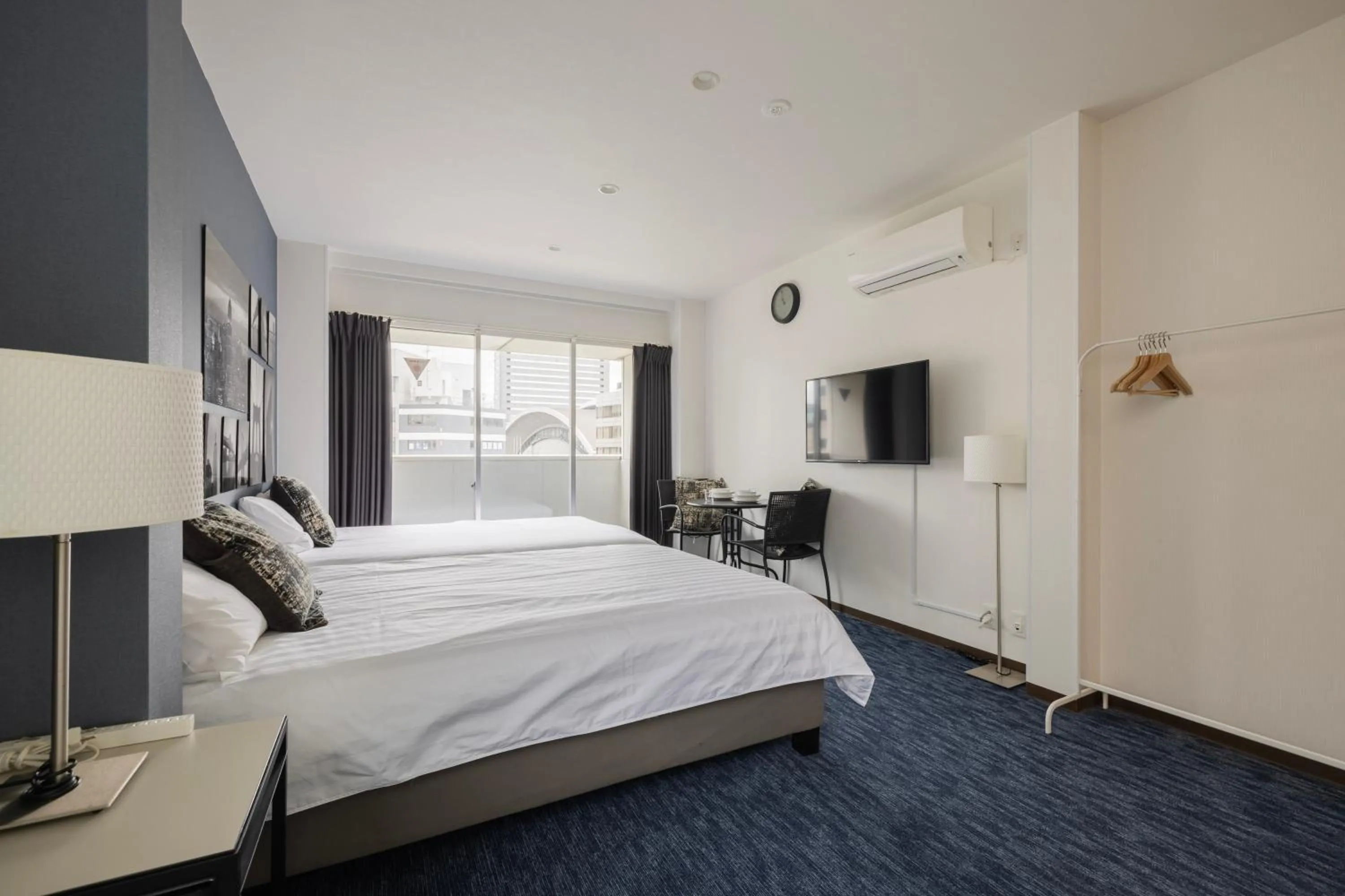 Bed in Namba Garden Square Apartment