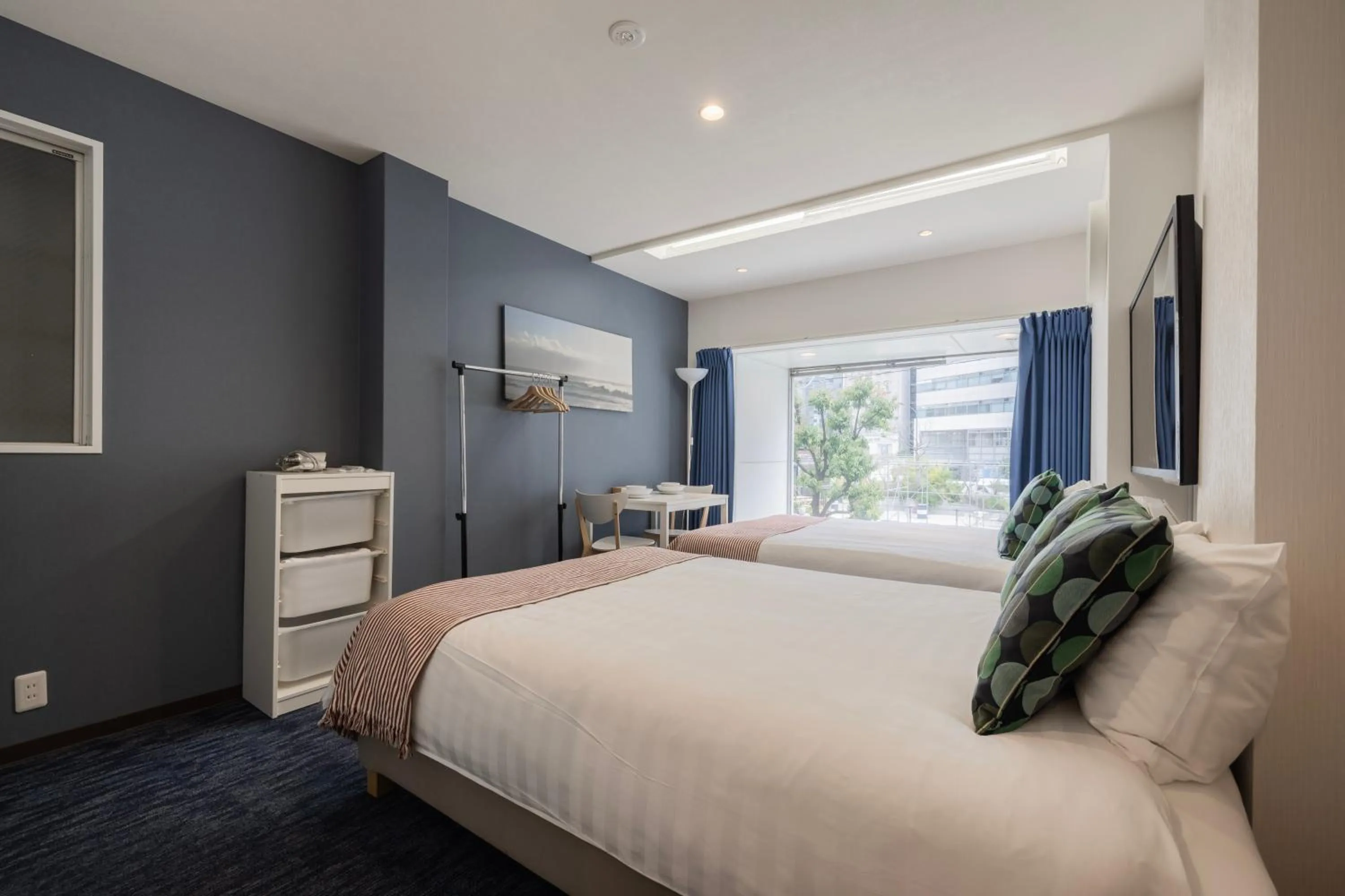 Bed in Namba Garden Square Apartment