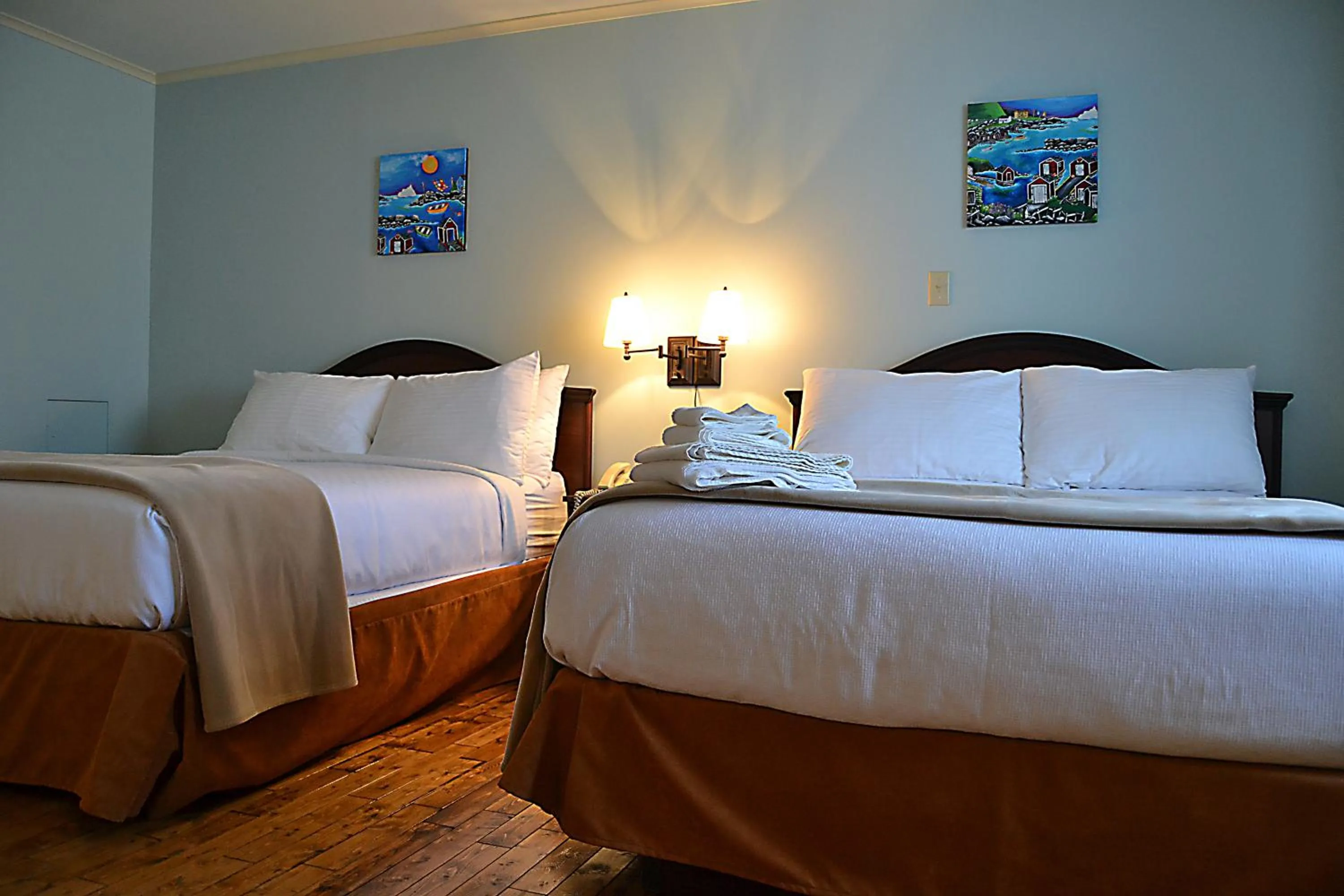 Bed in Anchor Inn Hotel and Suites