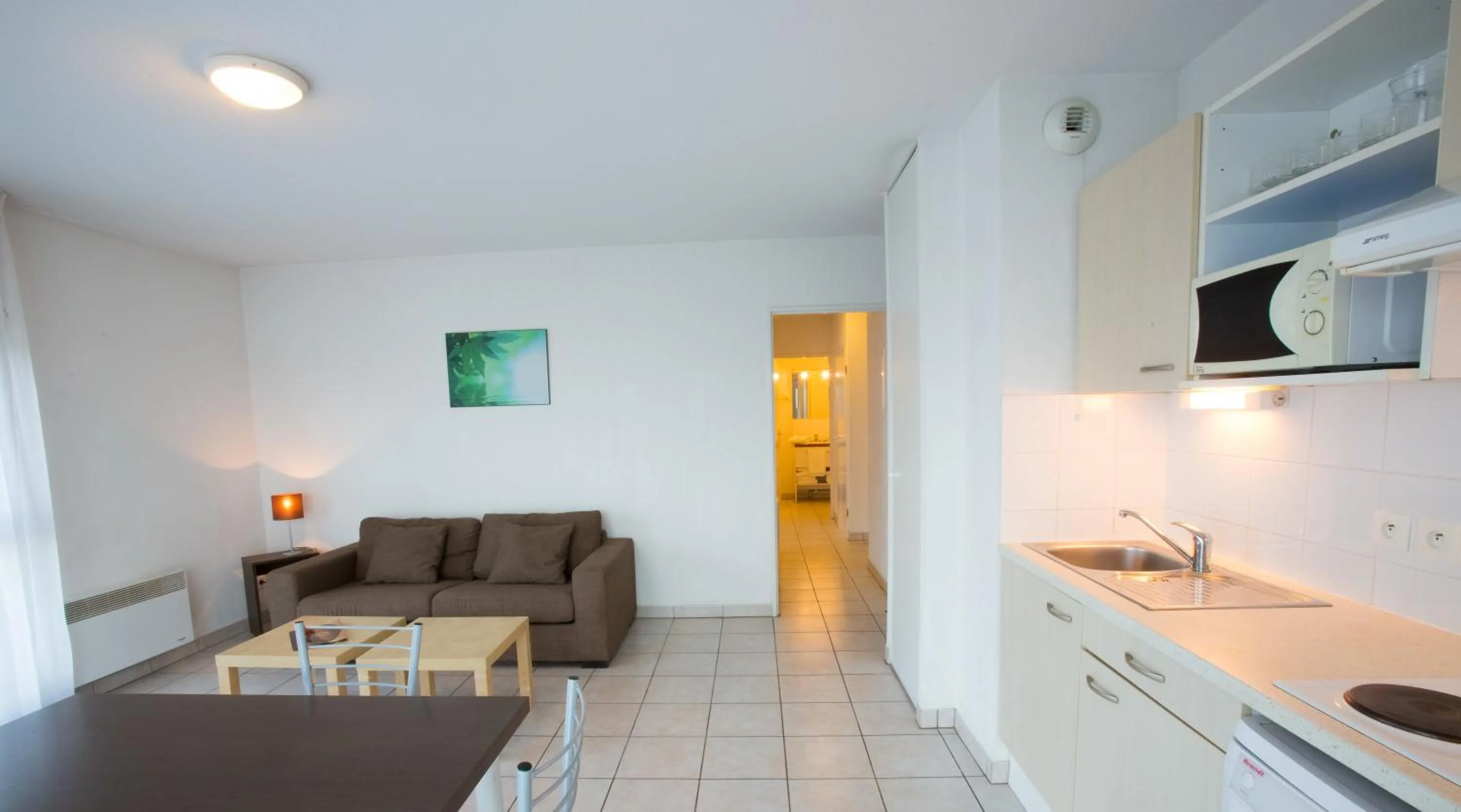 Kitchen or kitchenette in All Suites Appart Hôtel - Bordeaux - Mérignac Aéroport