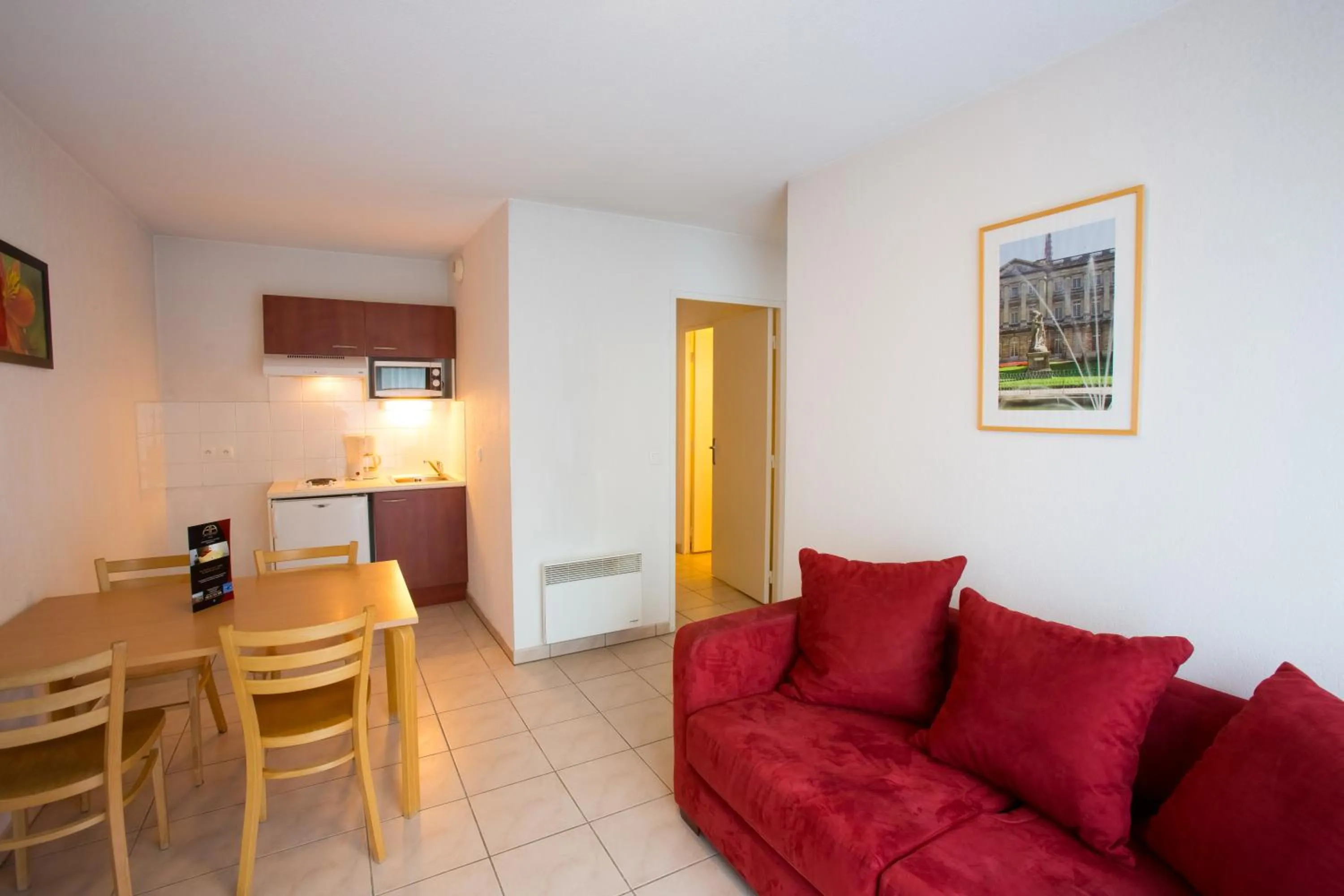 Kitchen or kitchenette in All Suites Appart Hôtel - Bordeaux - Mérignac Aéroport