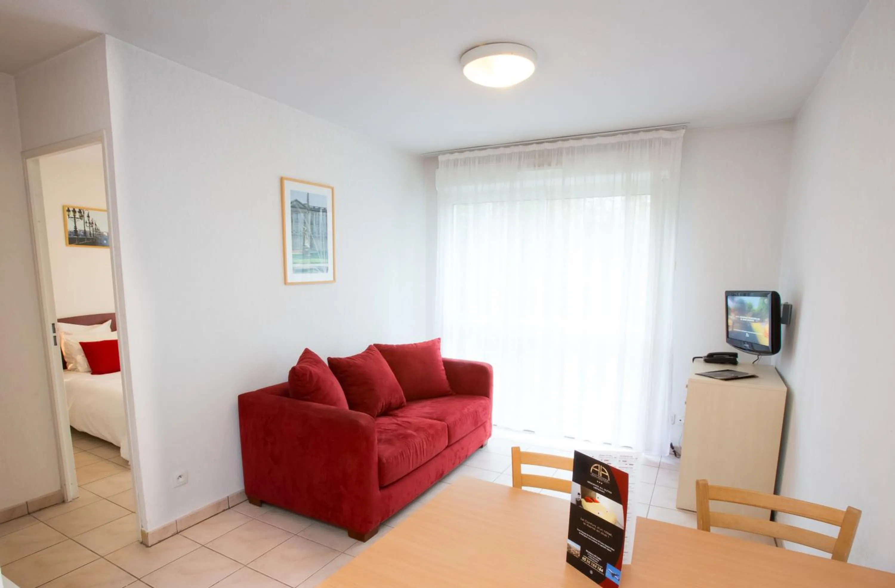 Living room in All Suites Appart Hôtel - Bordeaux - Mérignac Aéroport