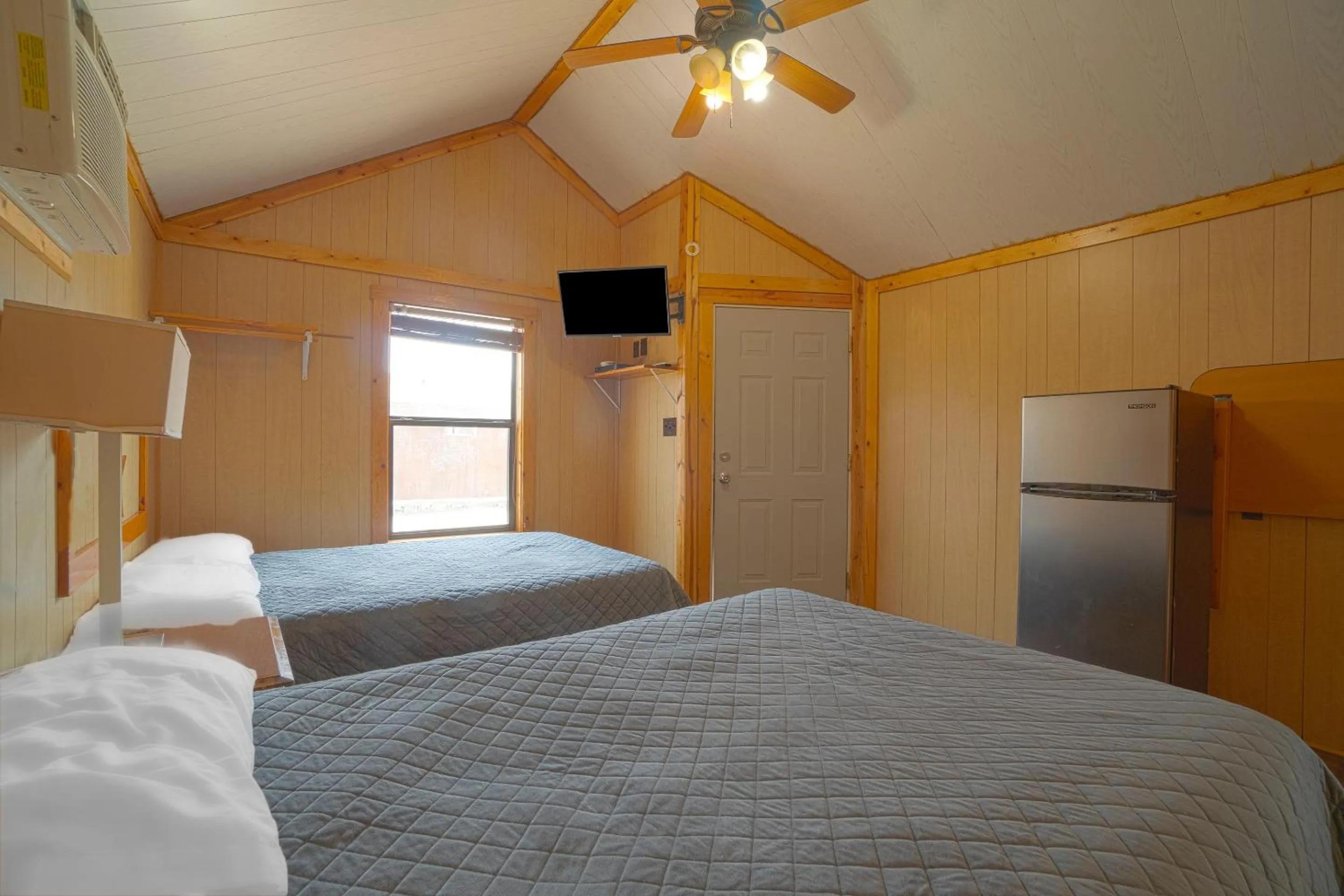 Bedroom in Grand Eagle Ford Lodge & RV Park