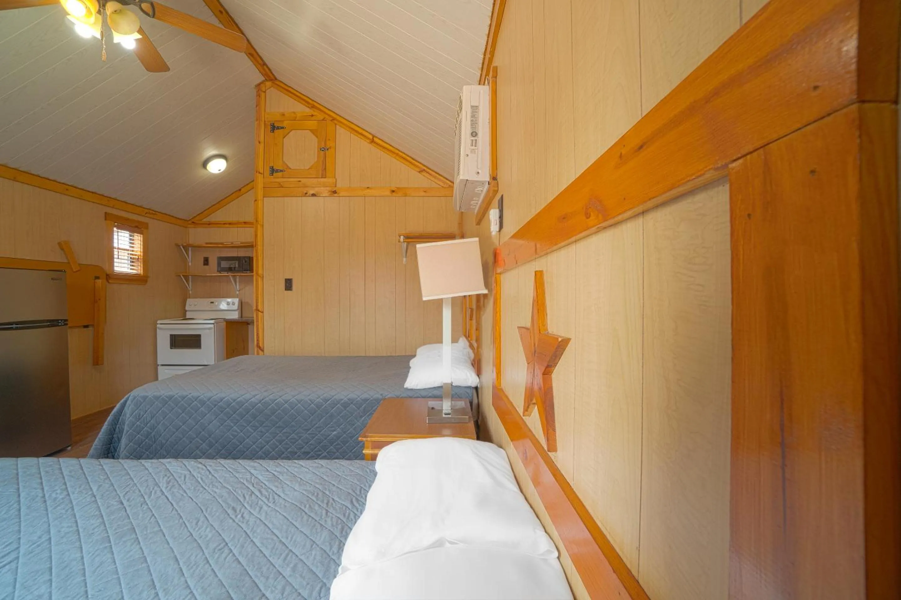 Bedroom in Grand Eagle Ford Lodge & RV Park
