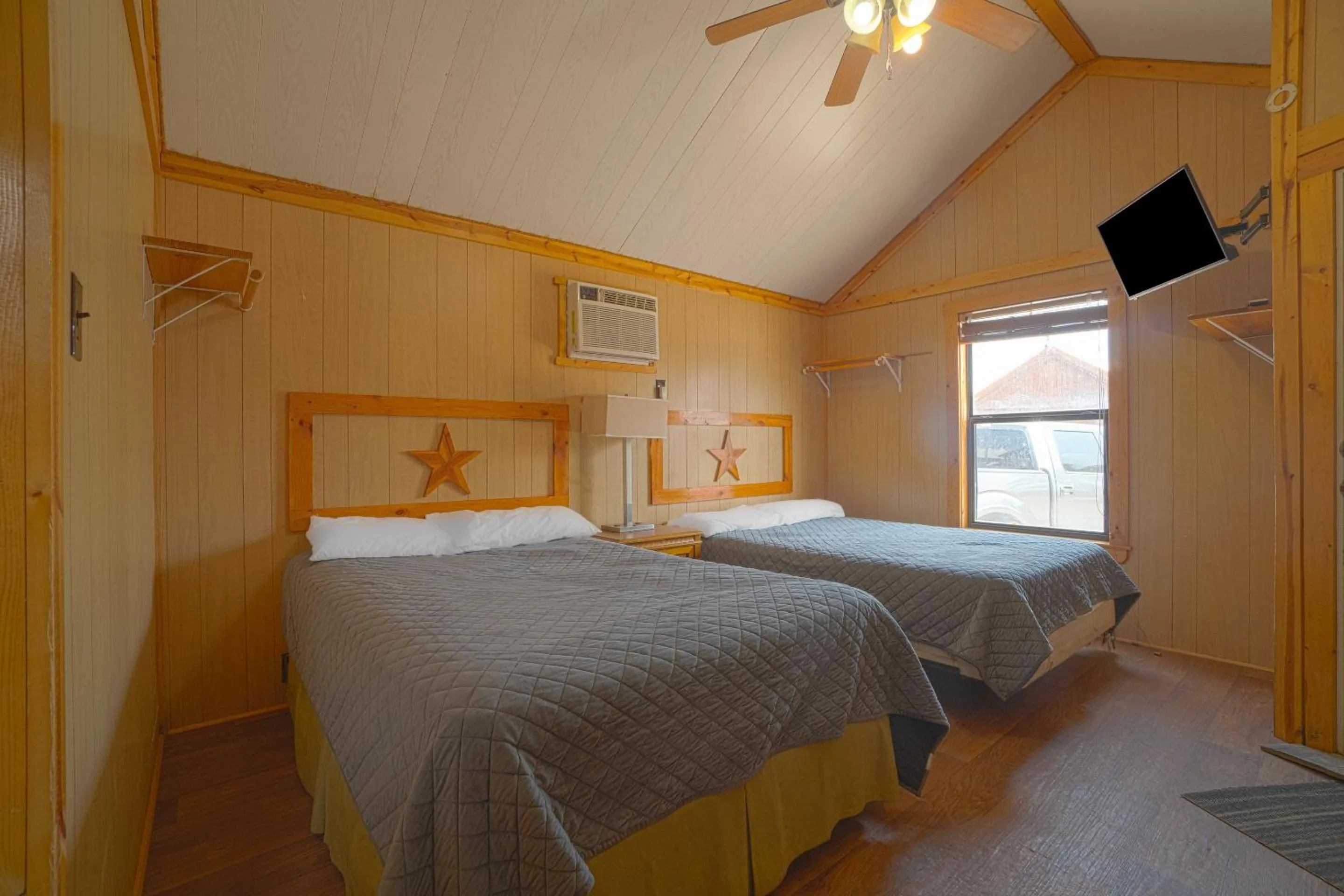 Bedroom in Grand Eagle Ford Lodge & RV Park