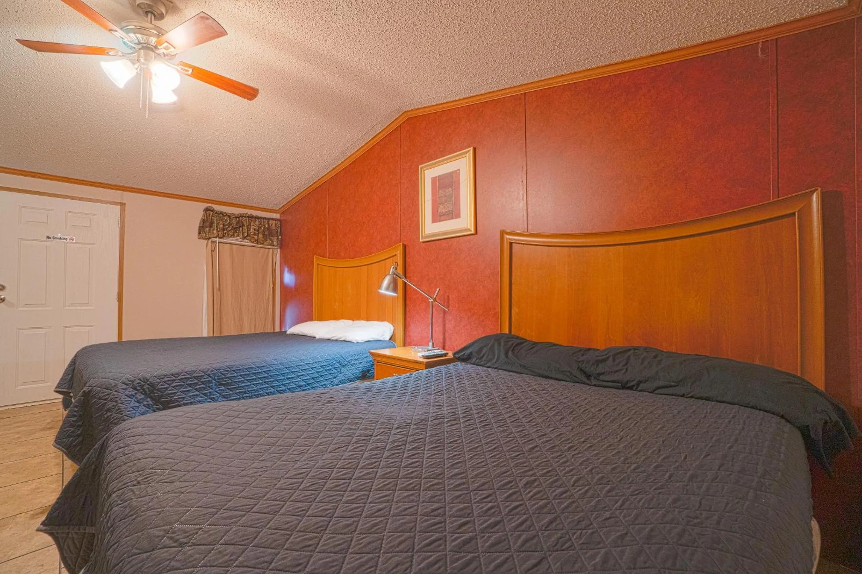 Bedroom in Grand Eagle Ford Lodge & RV Park