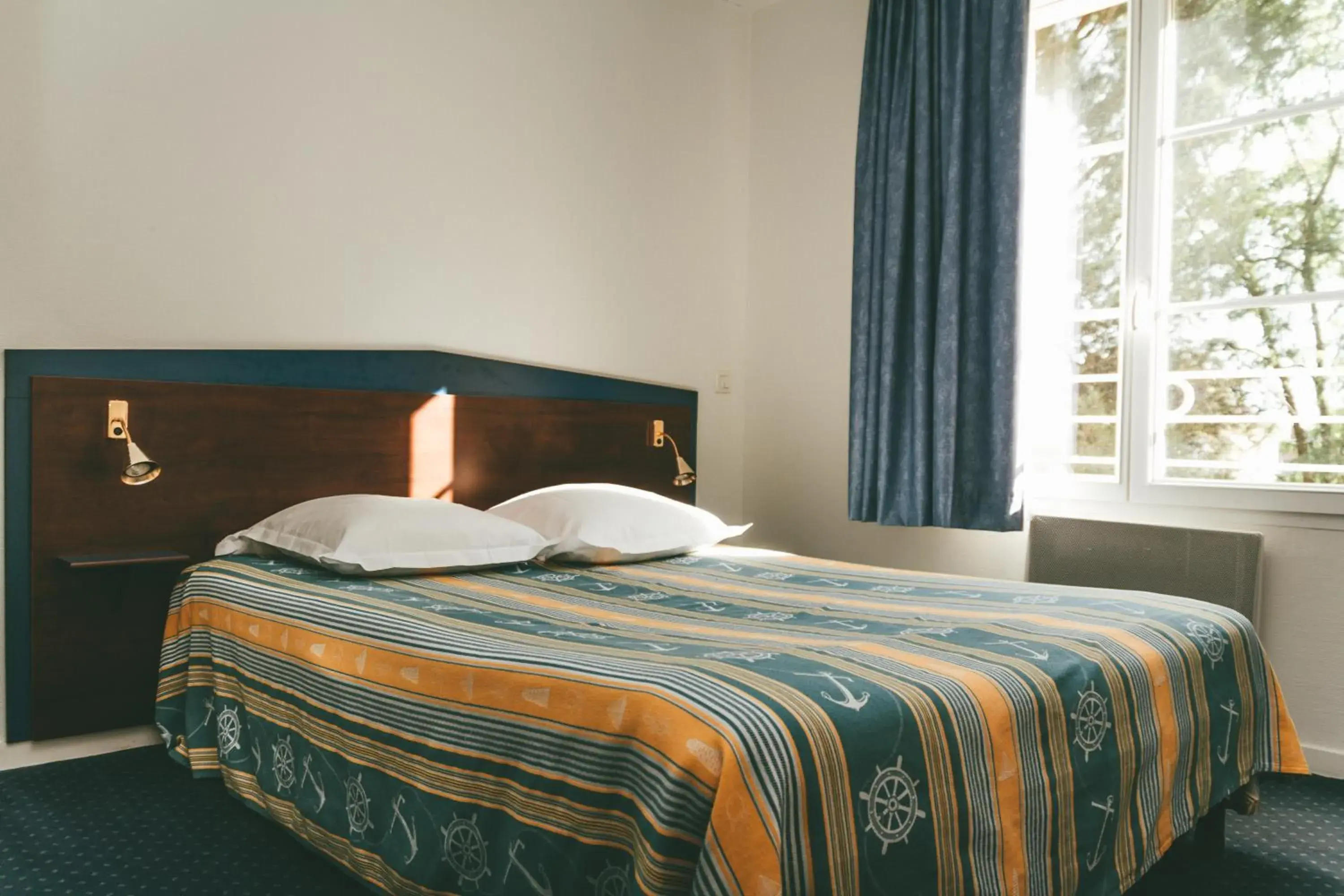 Bed in Terres de France - Appart'Hôtel La Roche-Posay Bed in Terres de France - Appart'Hôtel La Roche-Posay