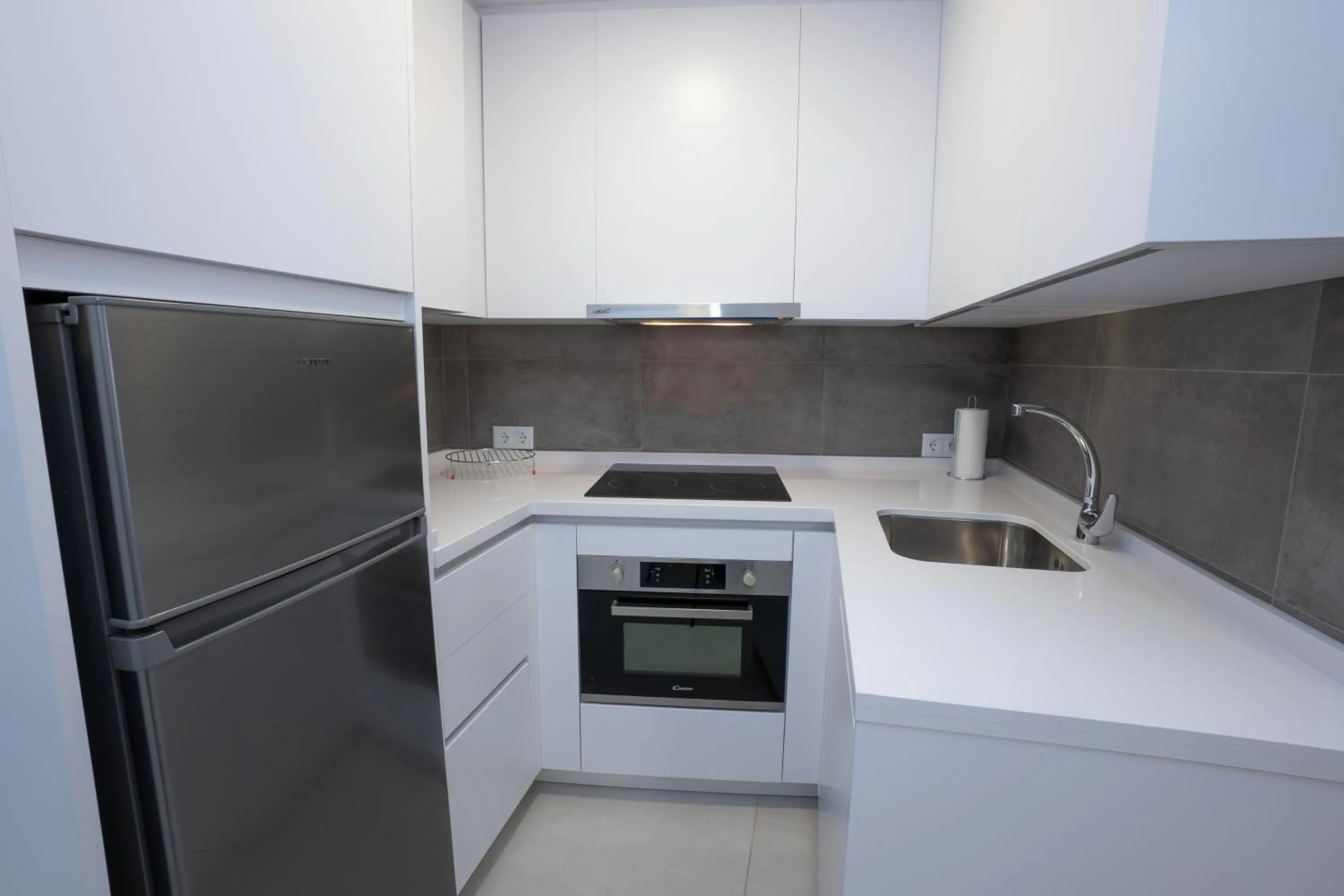 Kitchen or kitchenette in Apartamentos Mombasa 1 Planta