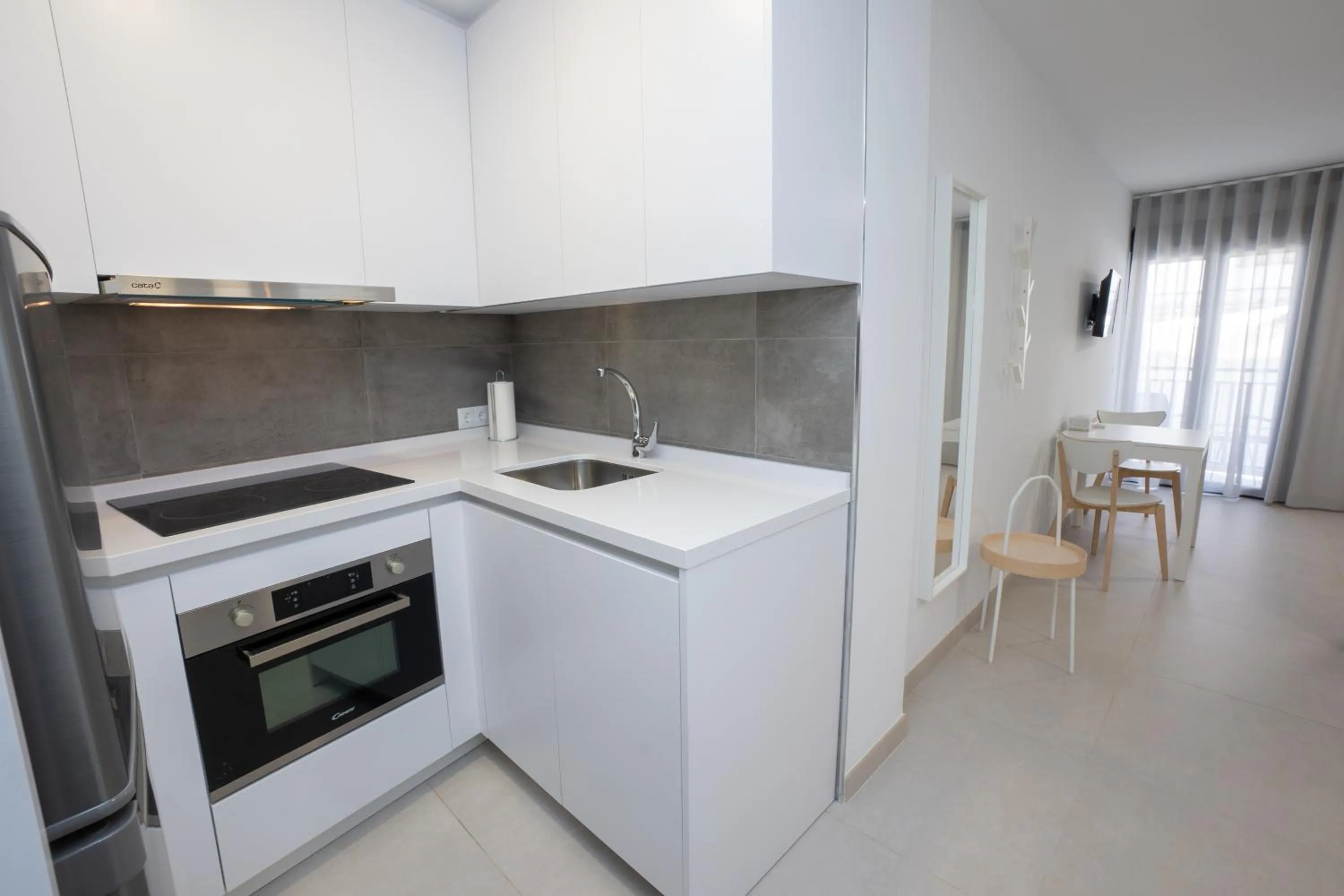 Kitchen or kitchenette in Apartamentos Mombasa 1 Planta