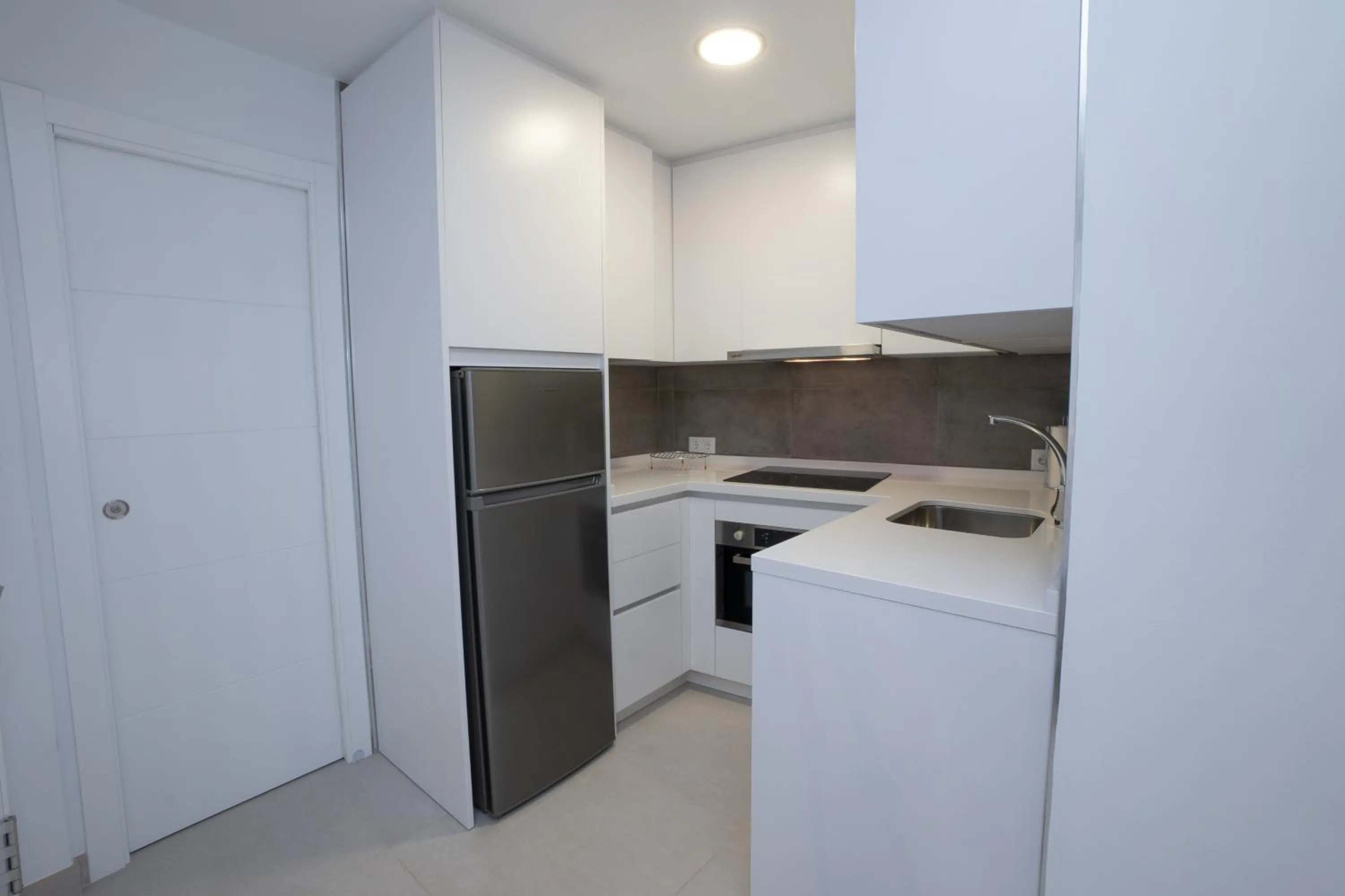 Kitchen or kitchenette in Apartamentos Mombasa 1 Planta