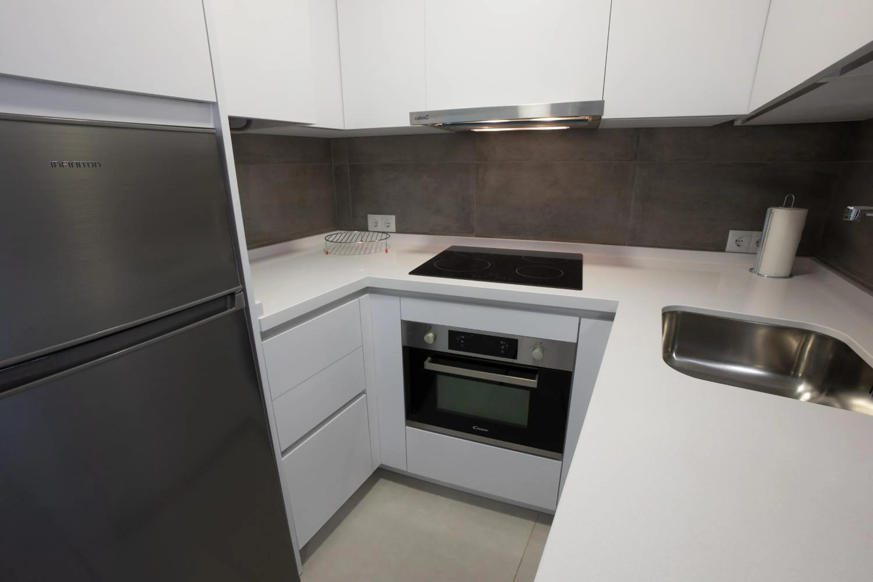 Kitchen or kitchenette in Apartamentos Mombasa 1 Planta