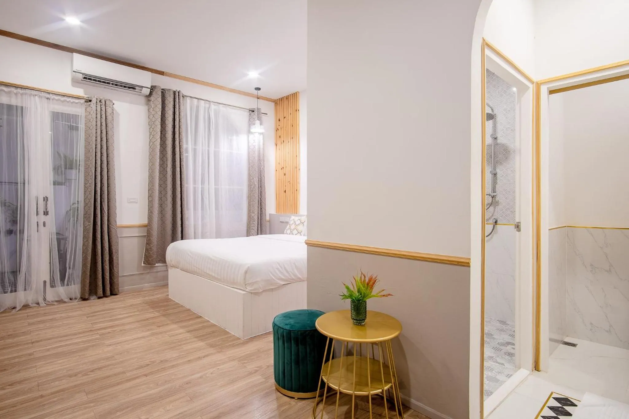 Living room, Bed in Isara Boutique Hotel and Cafe