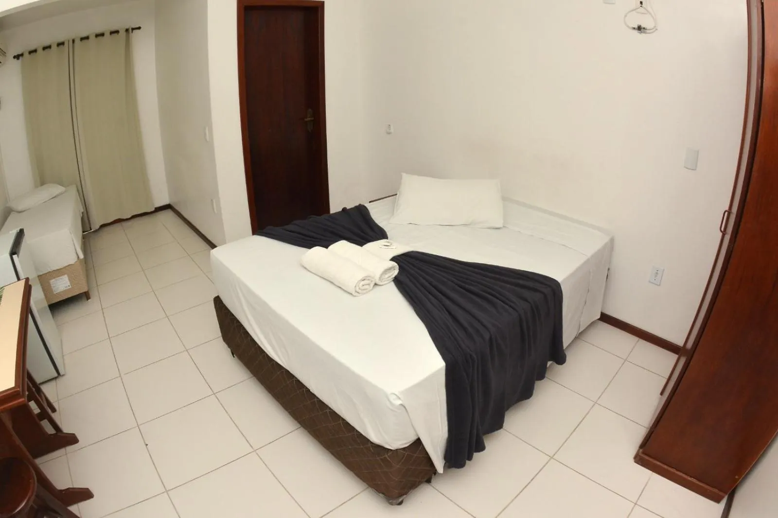 Bed in Hotel Dom Fish