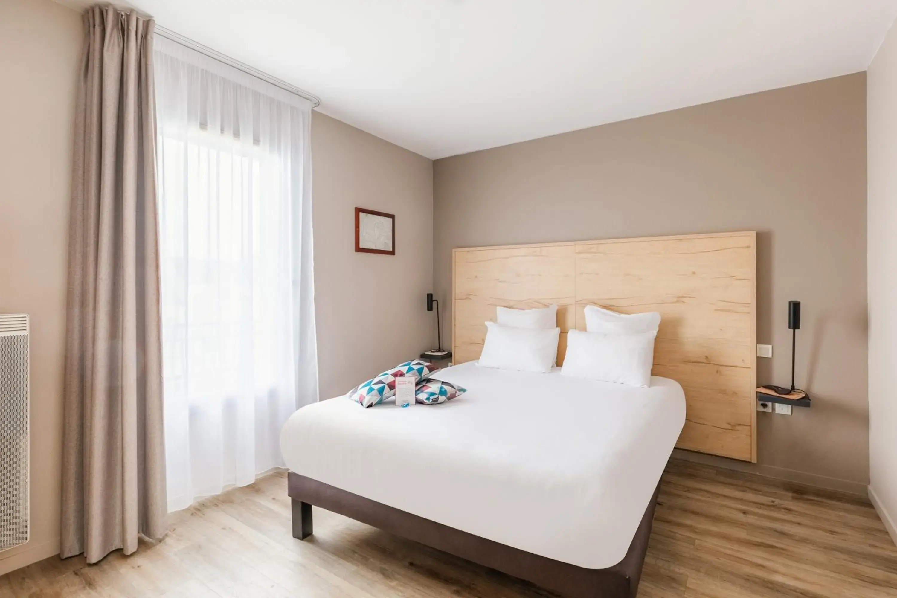 Bed in Appart'City Confort Nantes Cité des Congrès Bed in Appart'City Confort Nantes Cité des Congrès