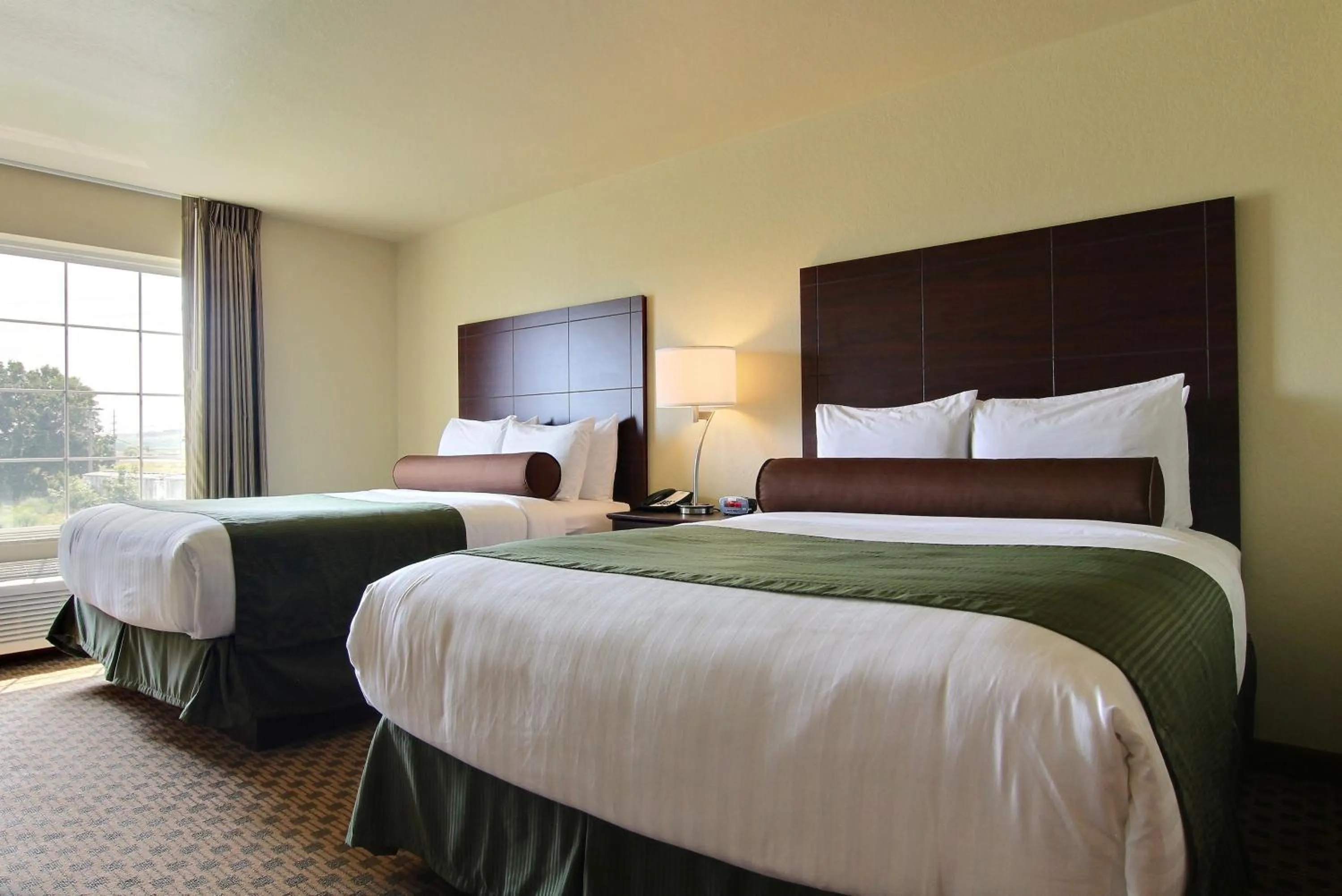 Bedroom, Bed in Cobblestone Inn & Suites - Harvey