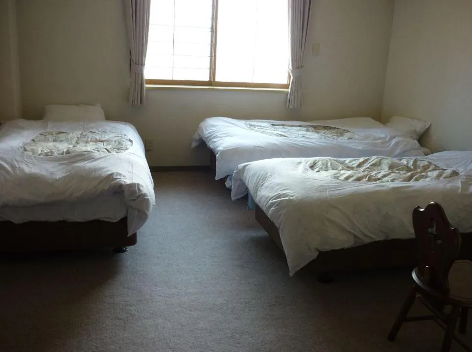 Bed in Stayful House Nakamachi