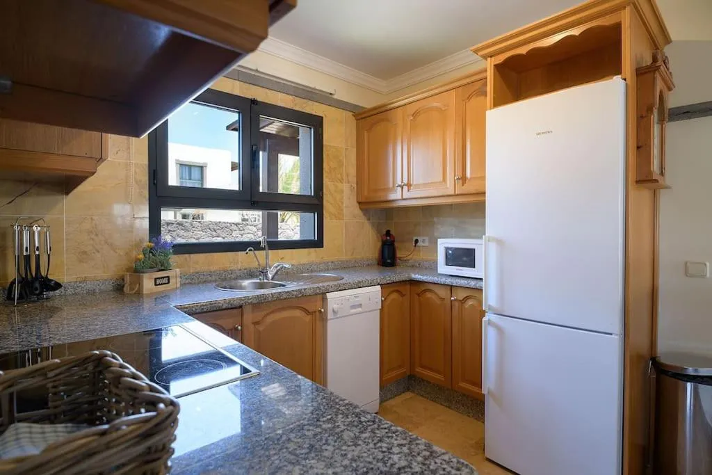 Kitchen or kitchenette in Hipoclub Villas, Aguamarina 10