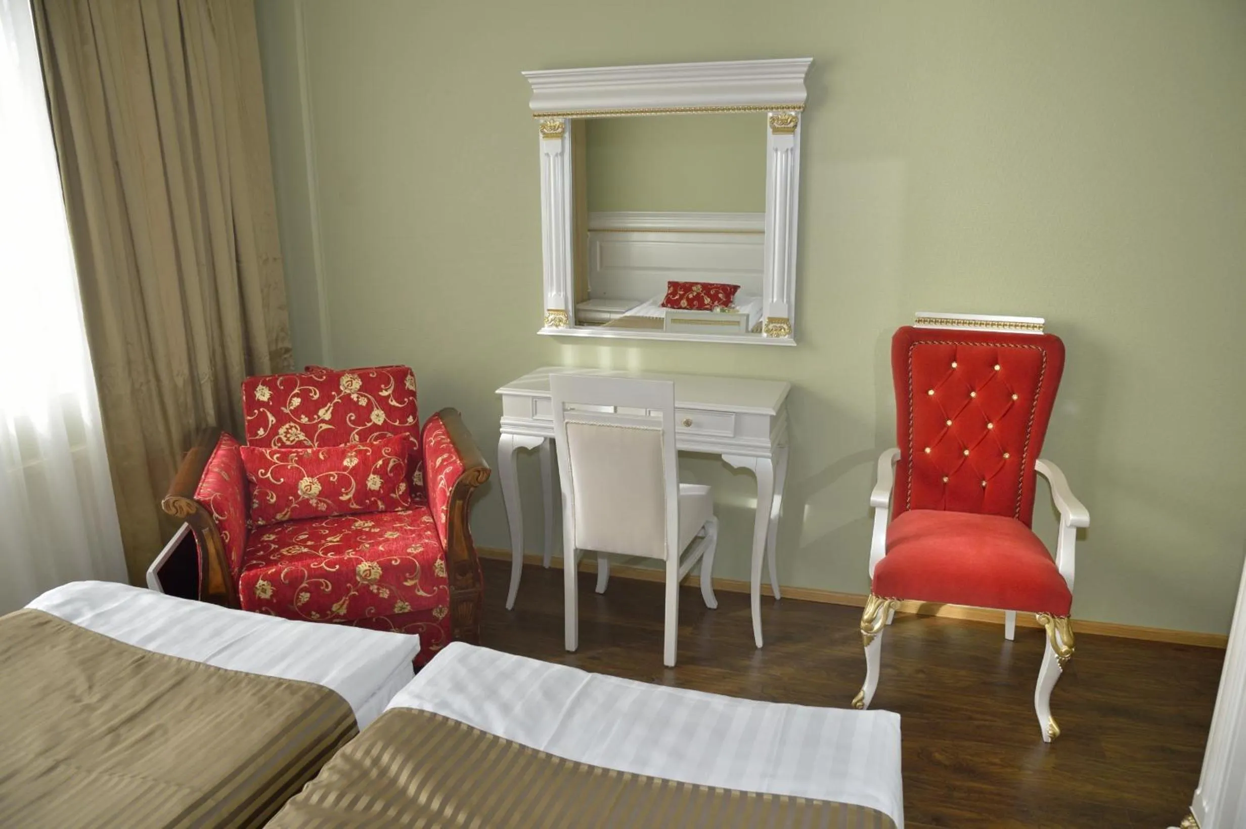 Seating area, Bed in Hotel Golden Dome Iisalmi