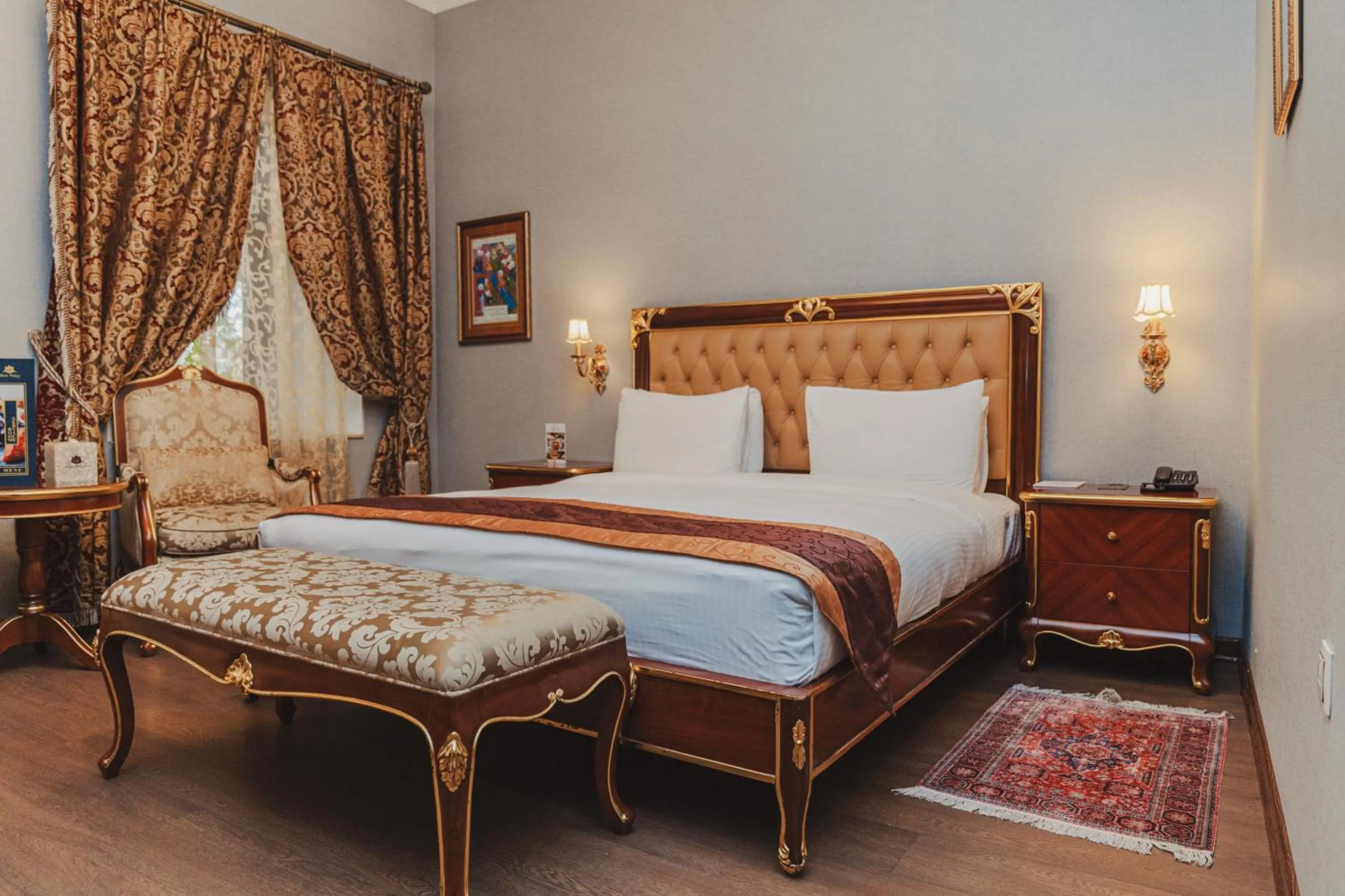 Bed in Shah Palace Luxury Museum Hotel