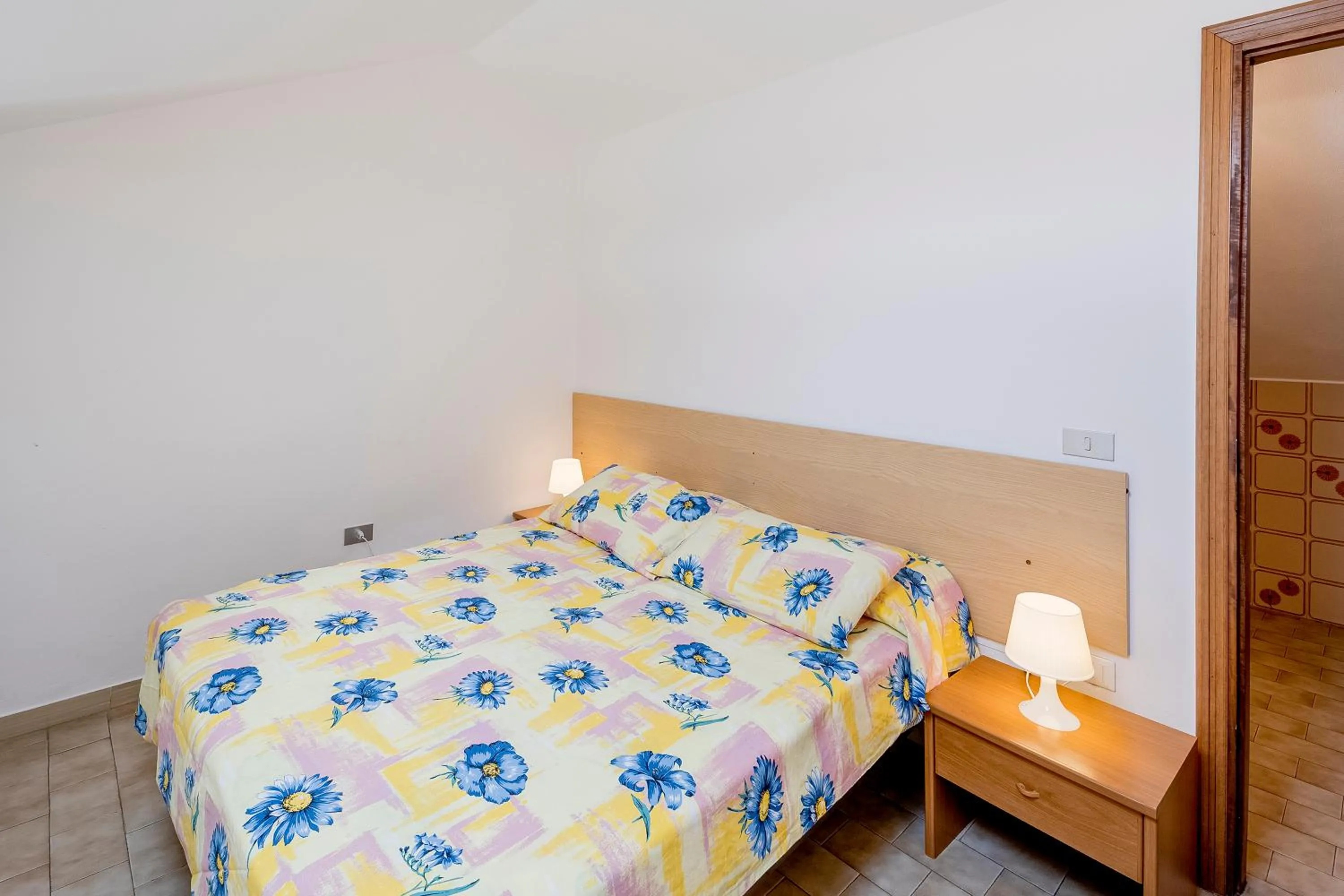 Bed in Loano Apartment Pool & Garden