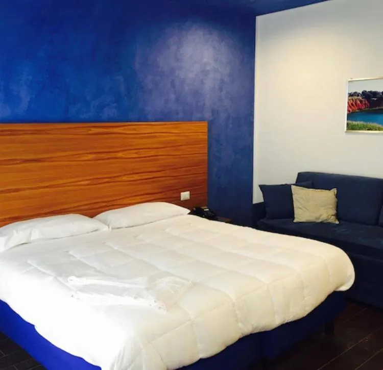 Bed in Hotel Zodiaco