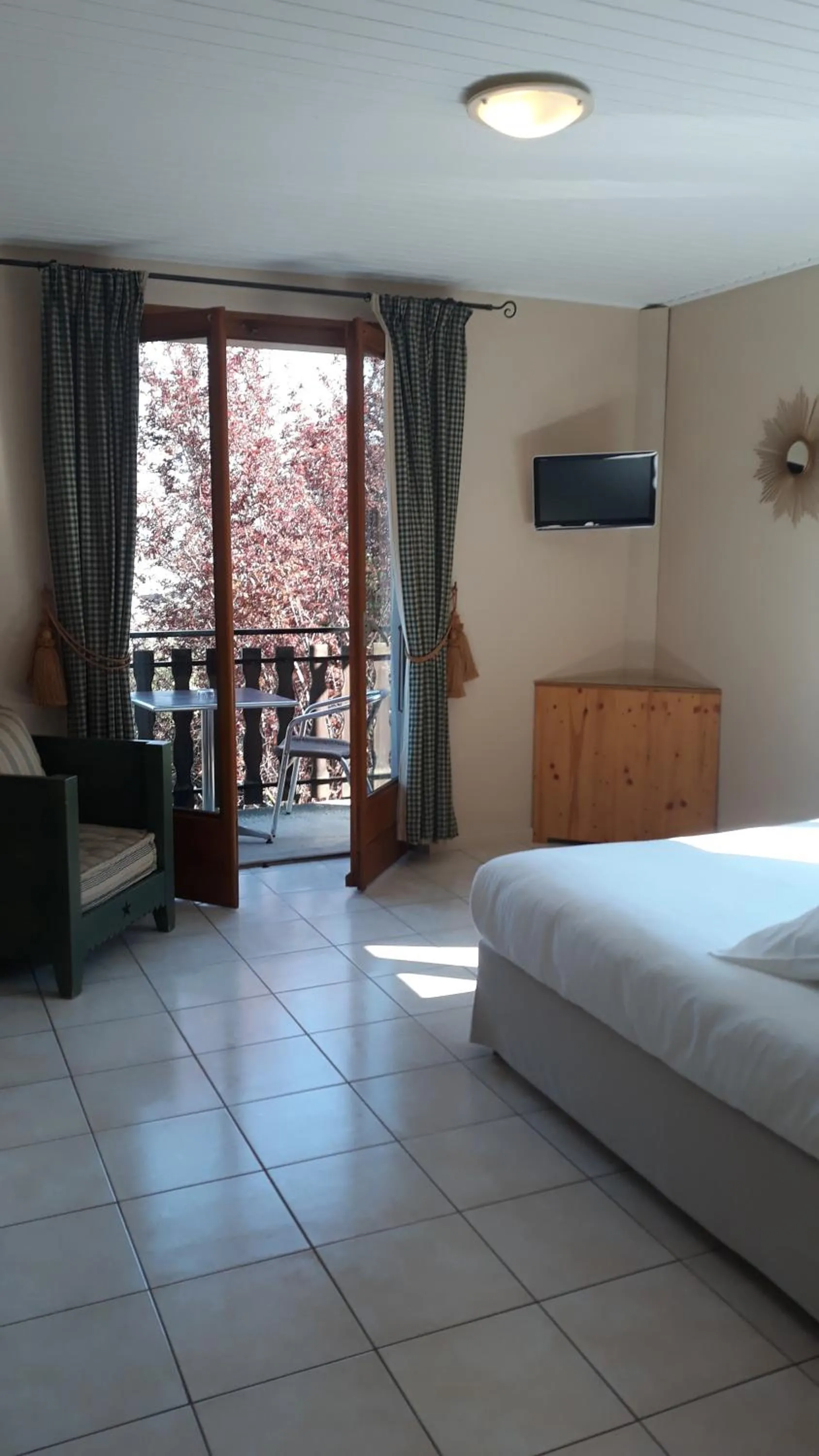 Bed in L'Oasis