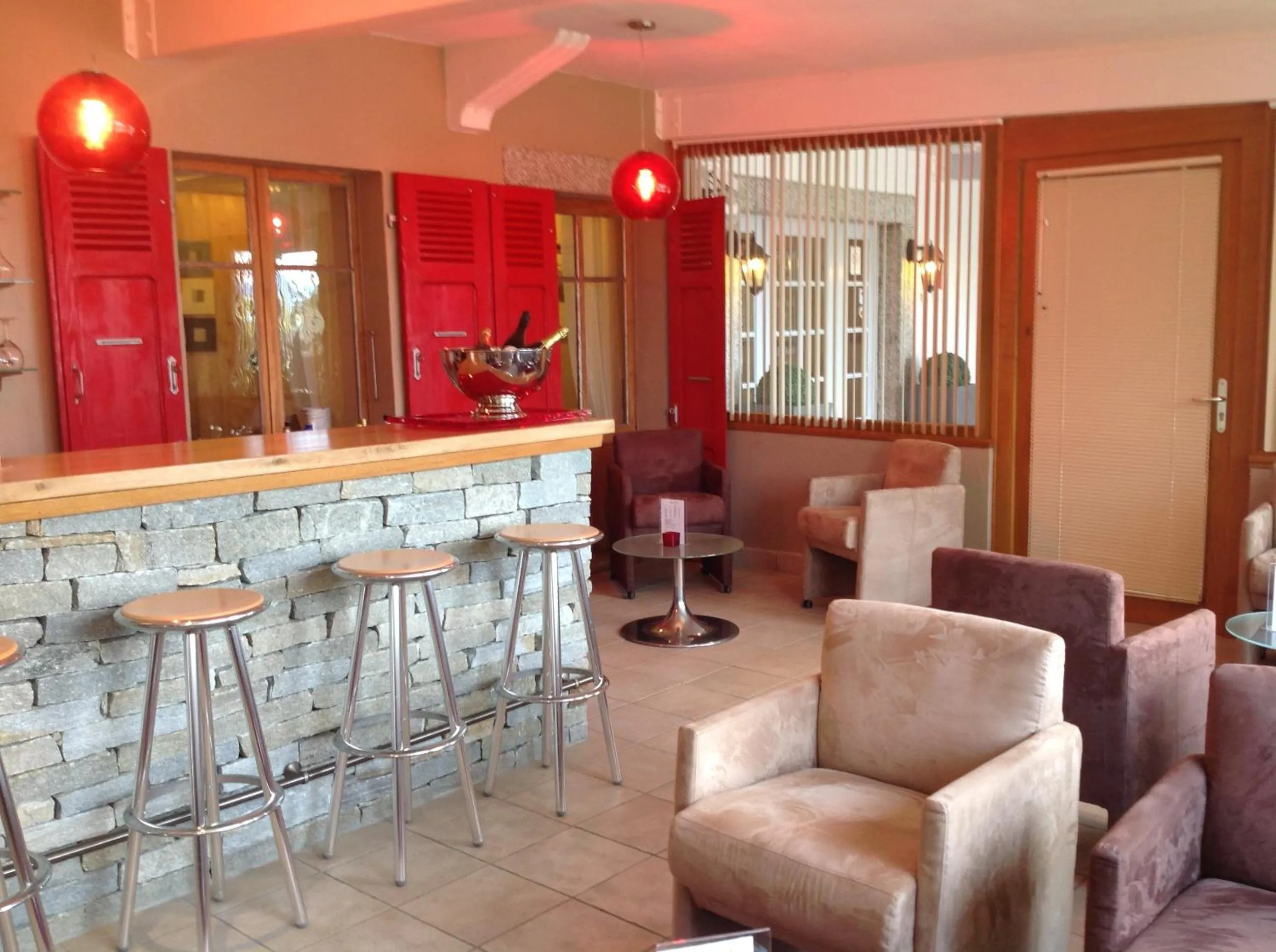 Lounge or bar in L'Oasis