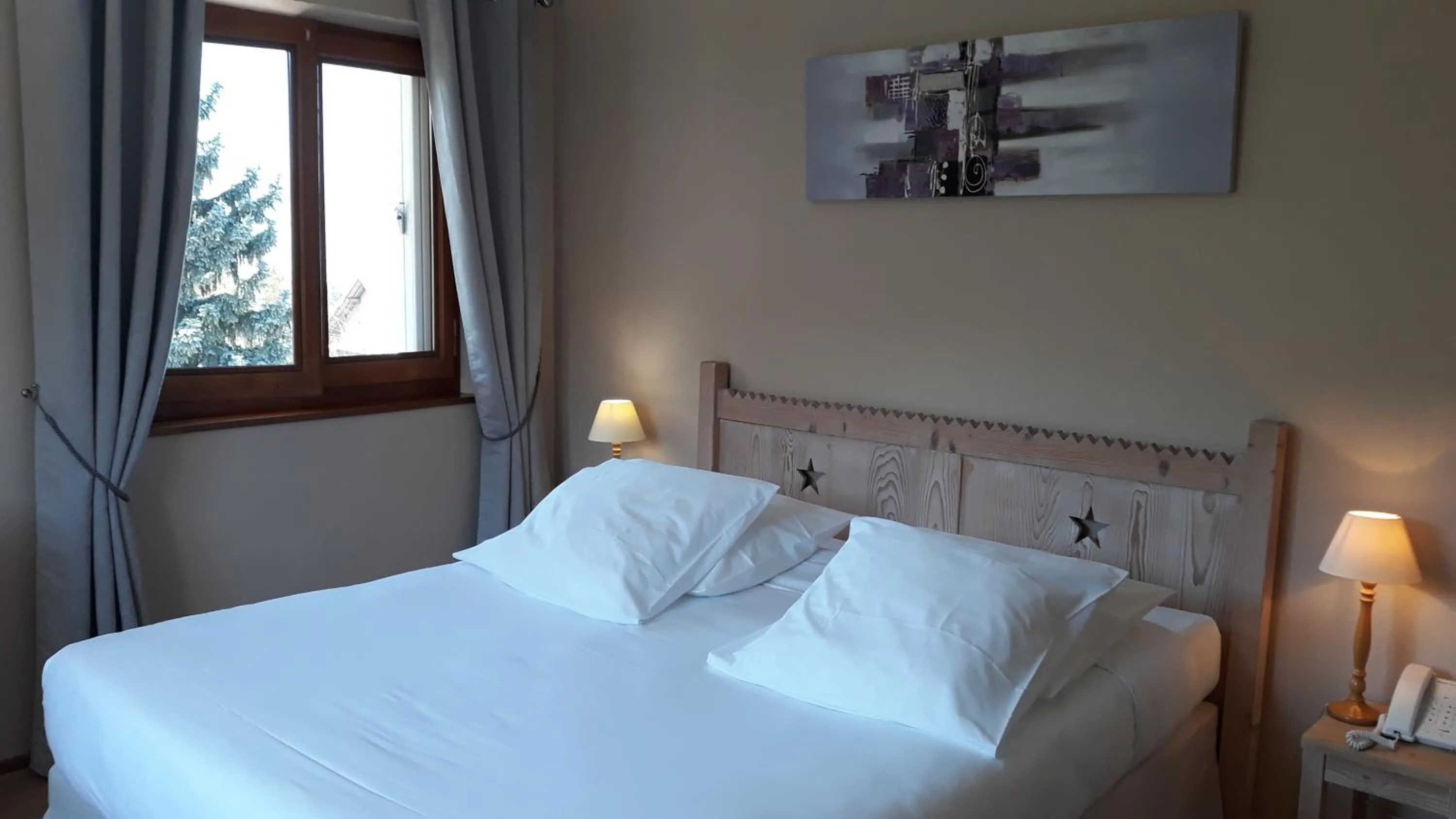Bed in L'Oasis