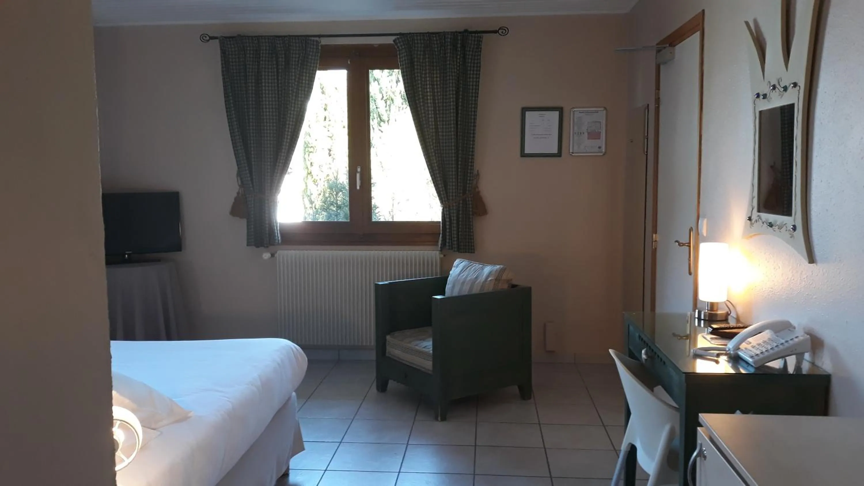 Bed in L'Oasis