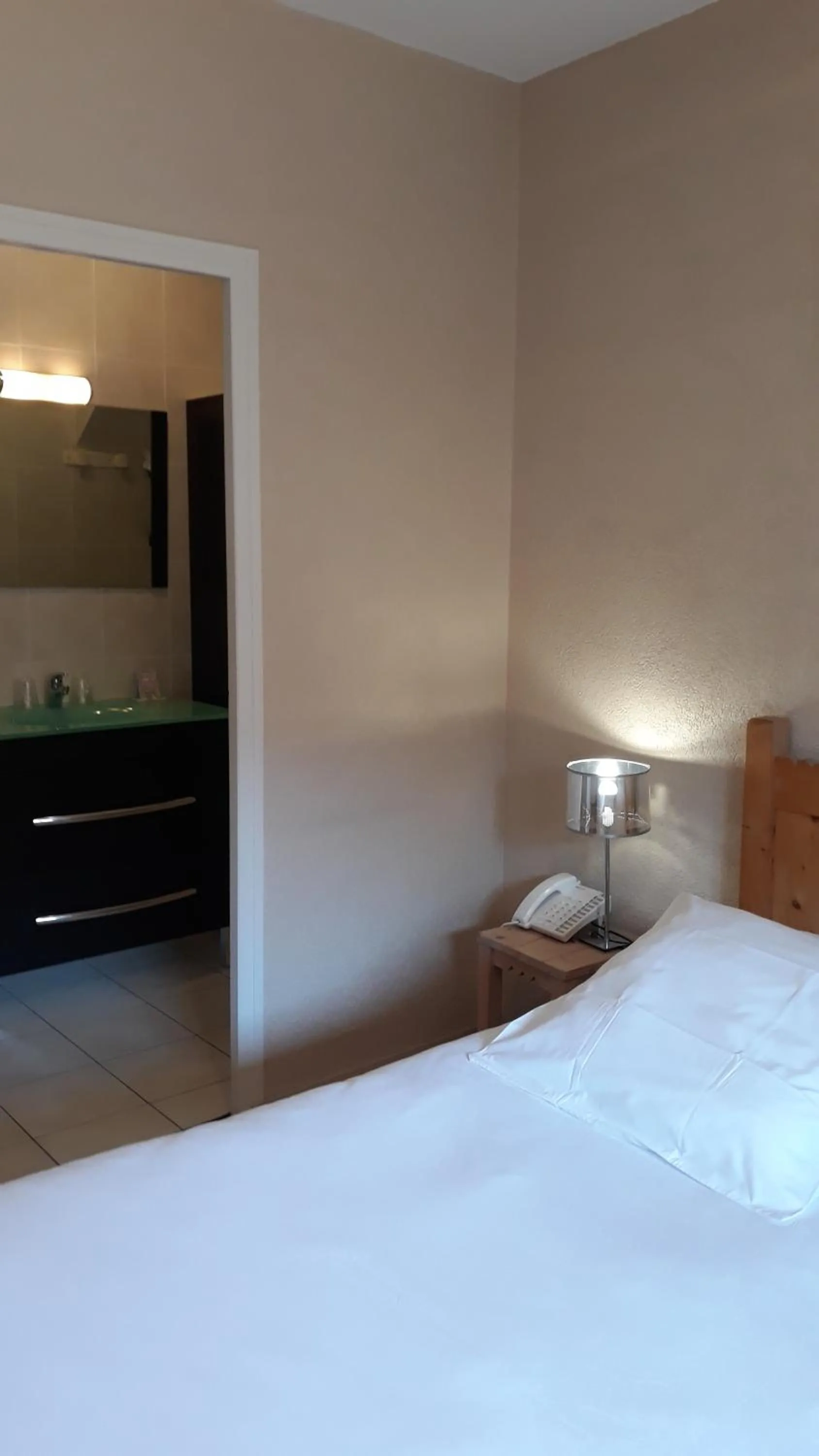 Bed in L'Oasis