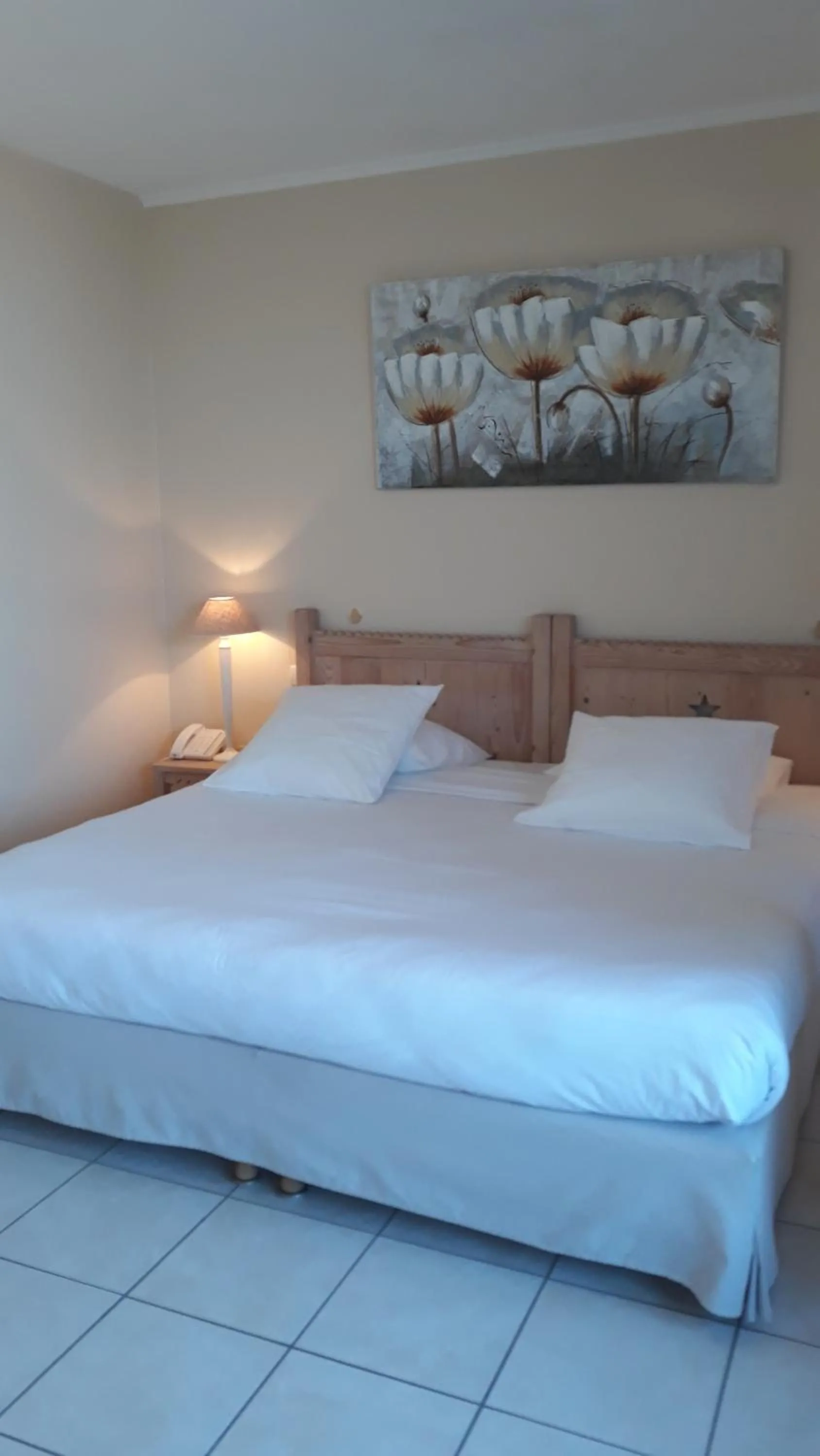 Bed in L'Oasis