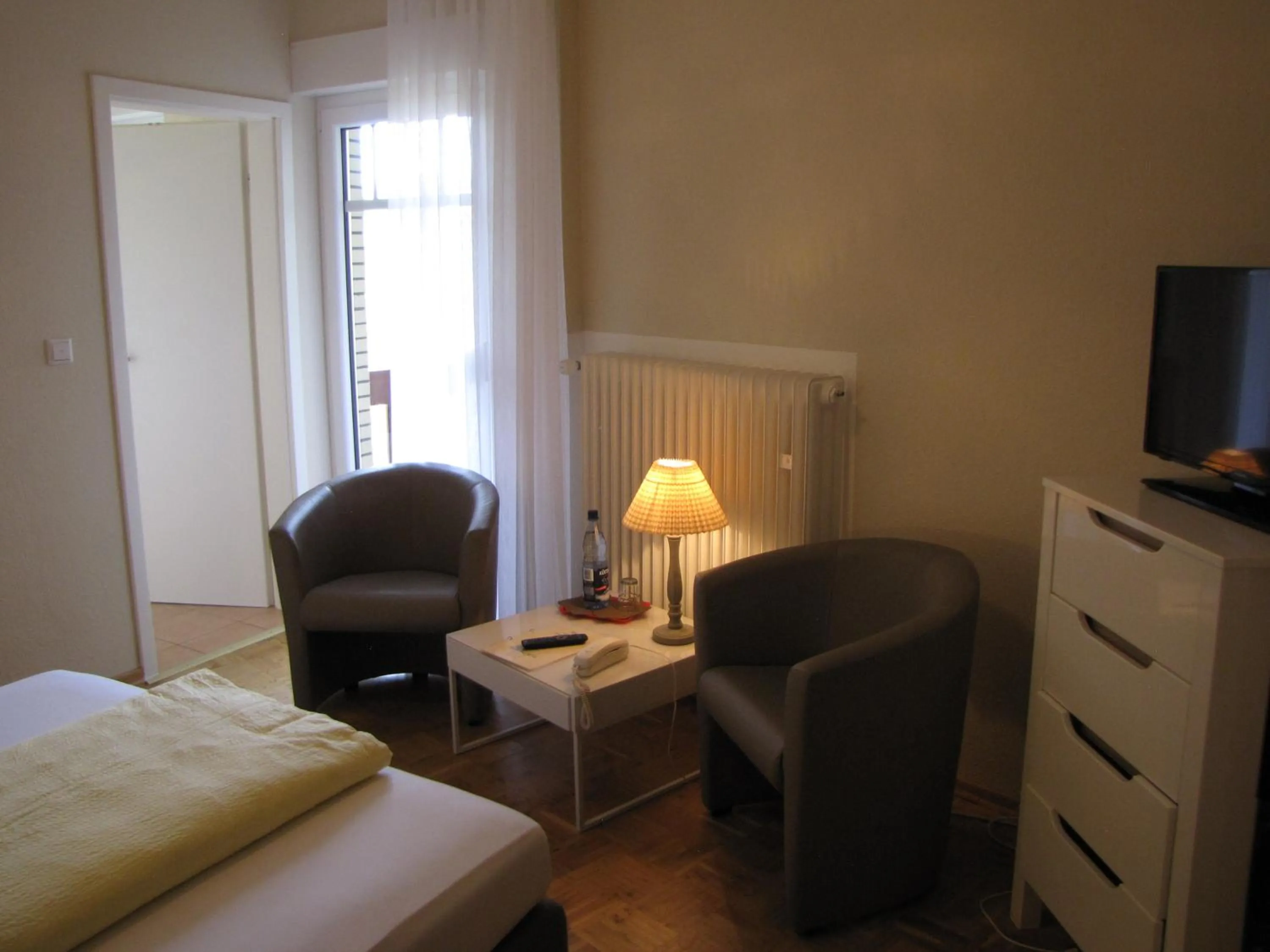 Seating area, Bed in Strandhotel-Najade