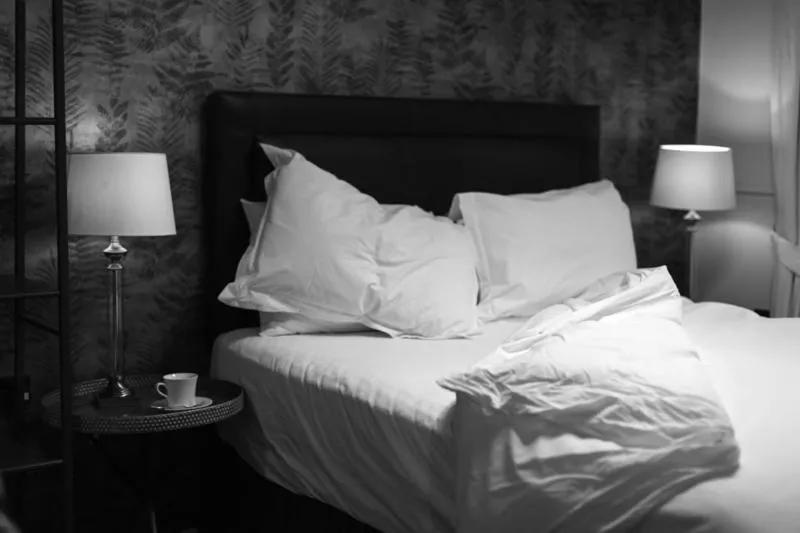 Bed in Limestone Hotel