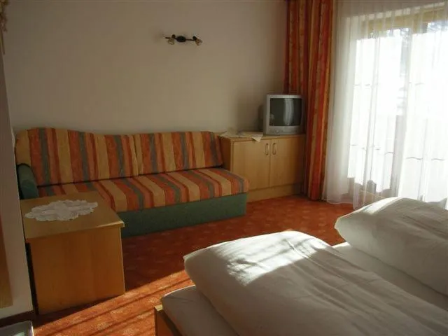 Living room, Bed in Haus Bergkristall