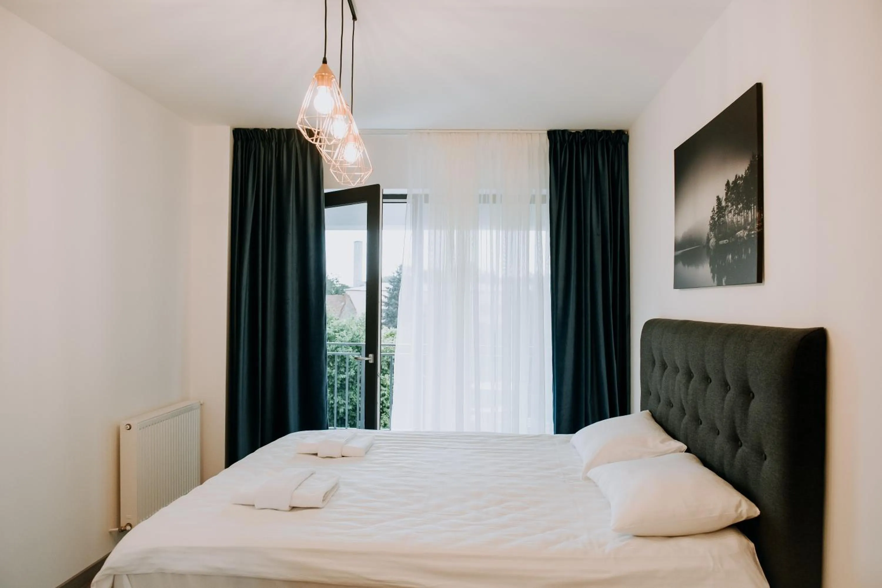 Bed in ZEN Central Apartments
