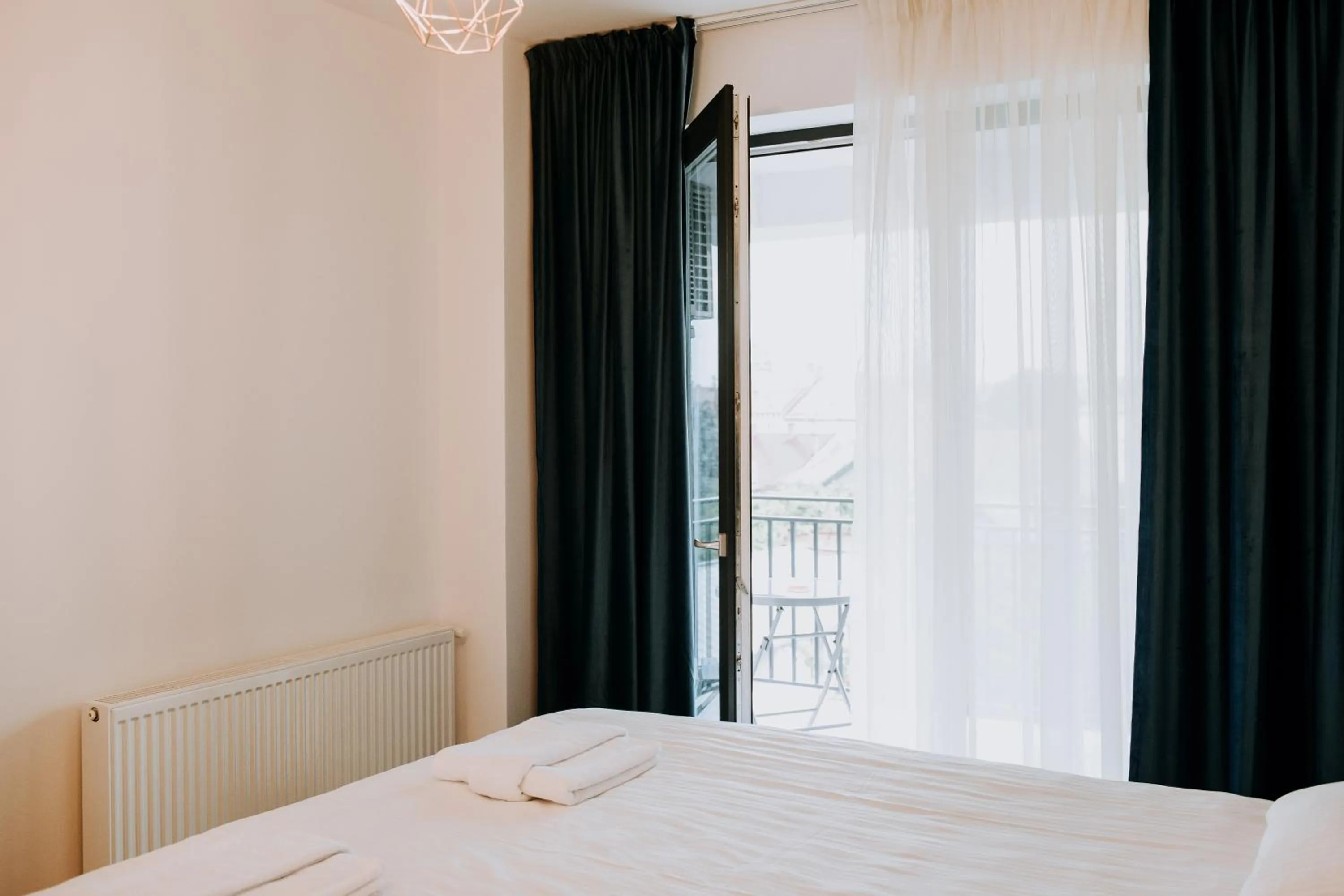 Bed in ZEN Central Apartments