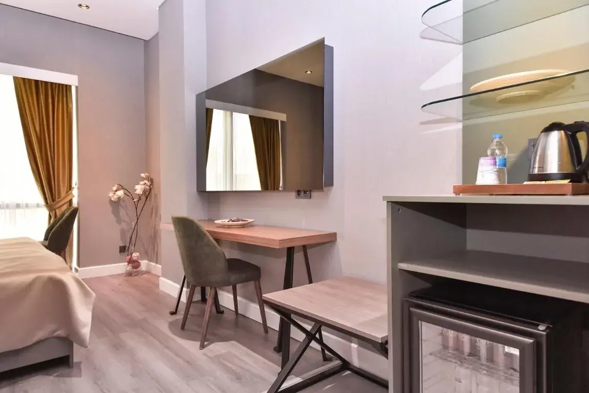 TV and multimedia, Bed in Atacity Hotel TV and multimedia, Bed in Atacity Hotel