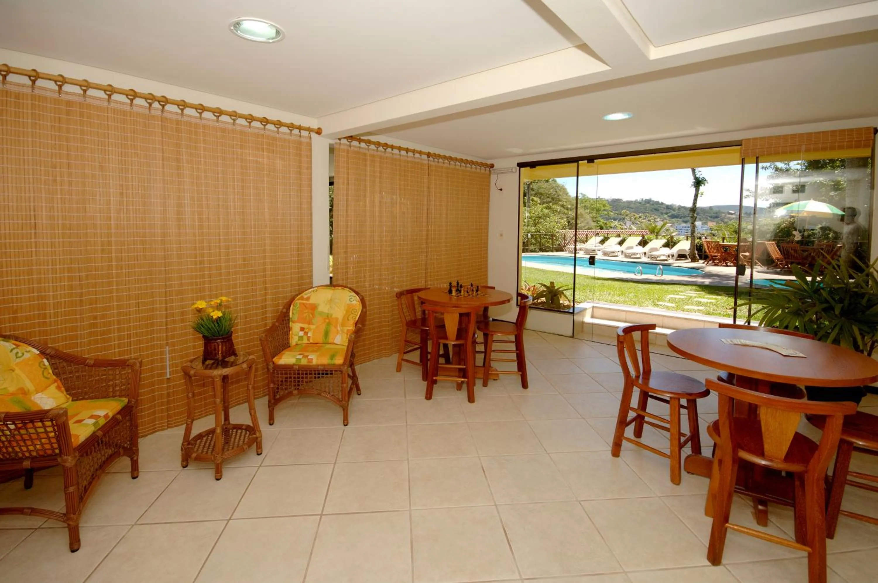 Communal lounge/ TV room in Pousada Aquarela de Bombinhas